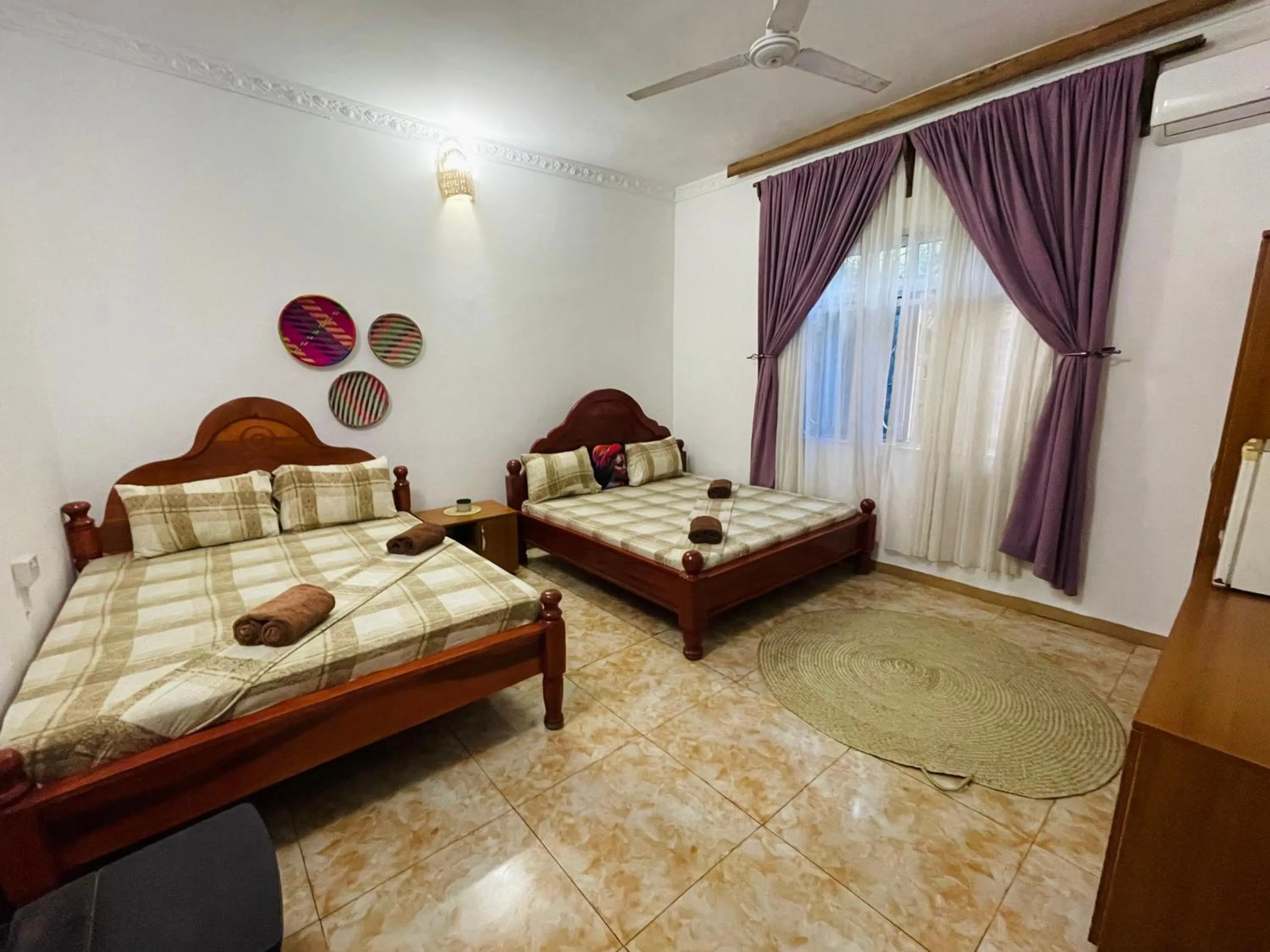 Bed in Max Hotel Nungwi