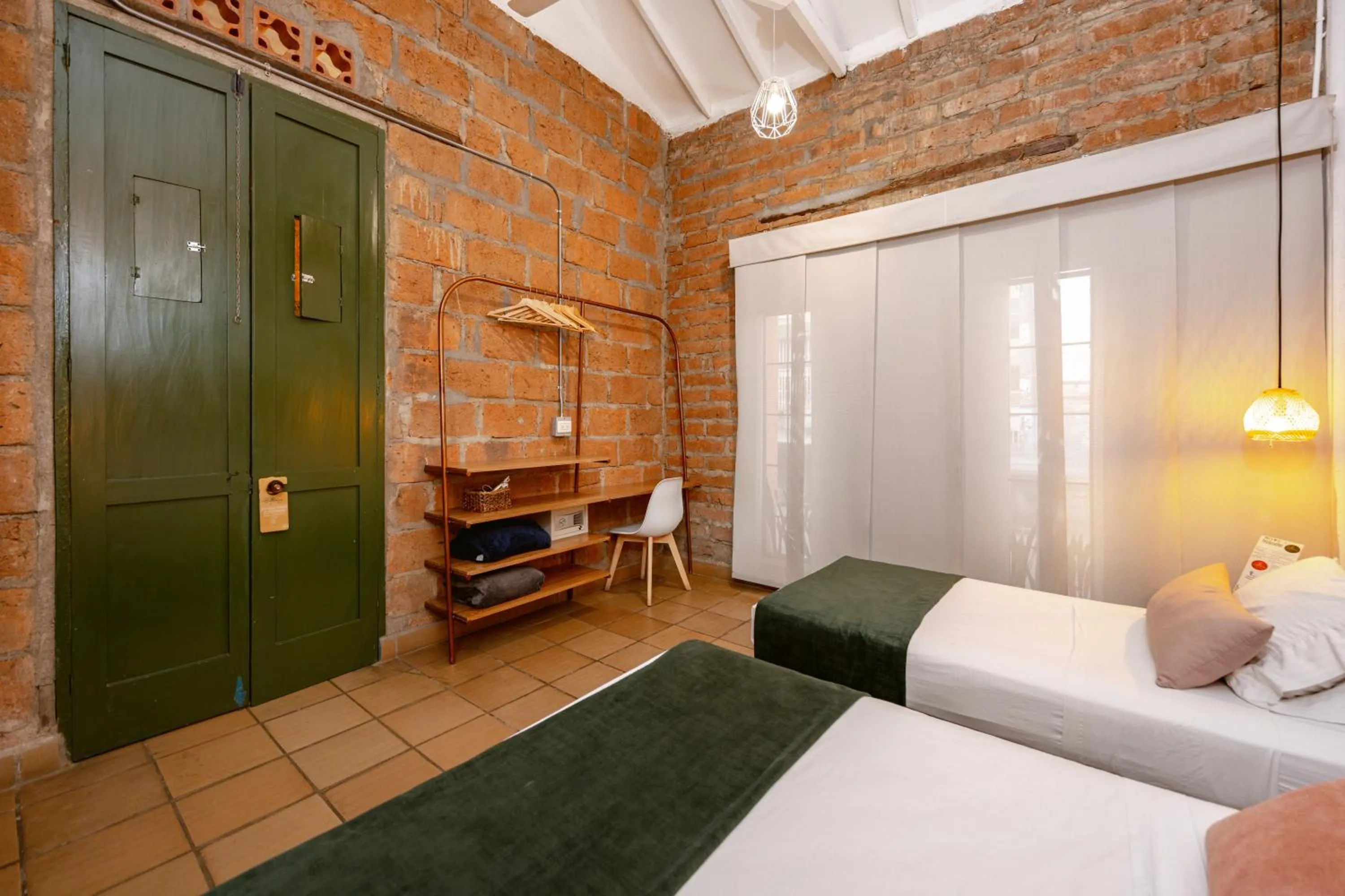 Bed in Botánica Casa Hotel