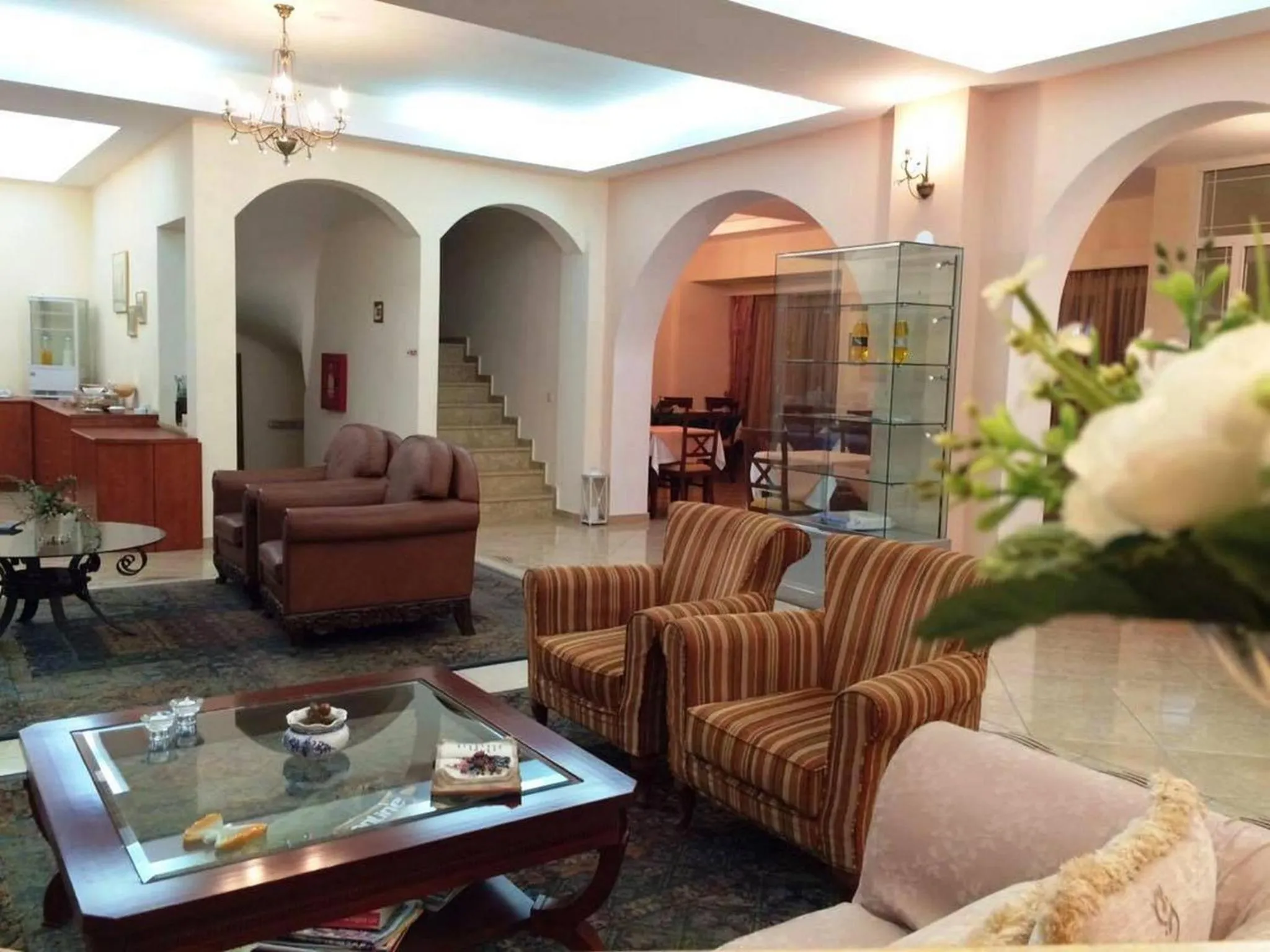 Communal lounge/ TV room in Nefeli Boutique Hotel