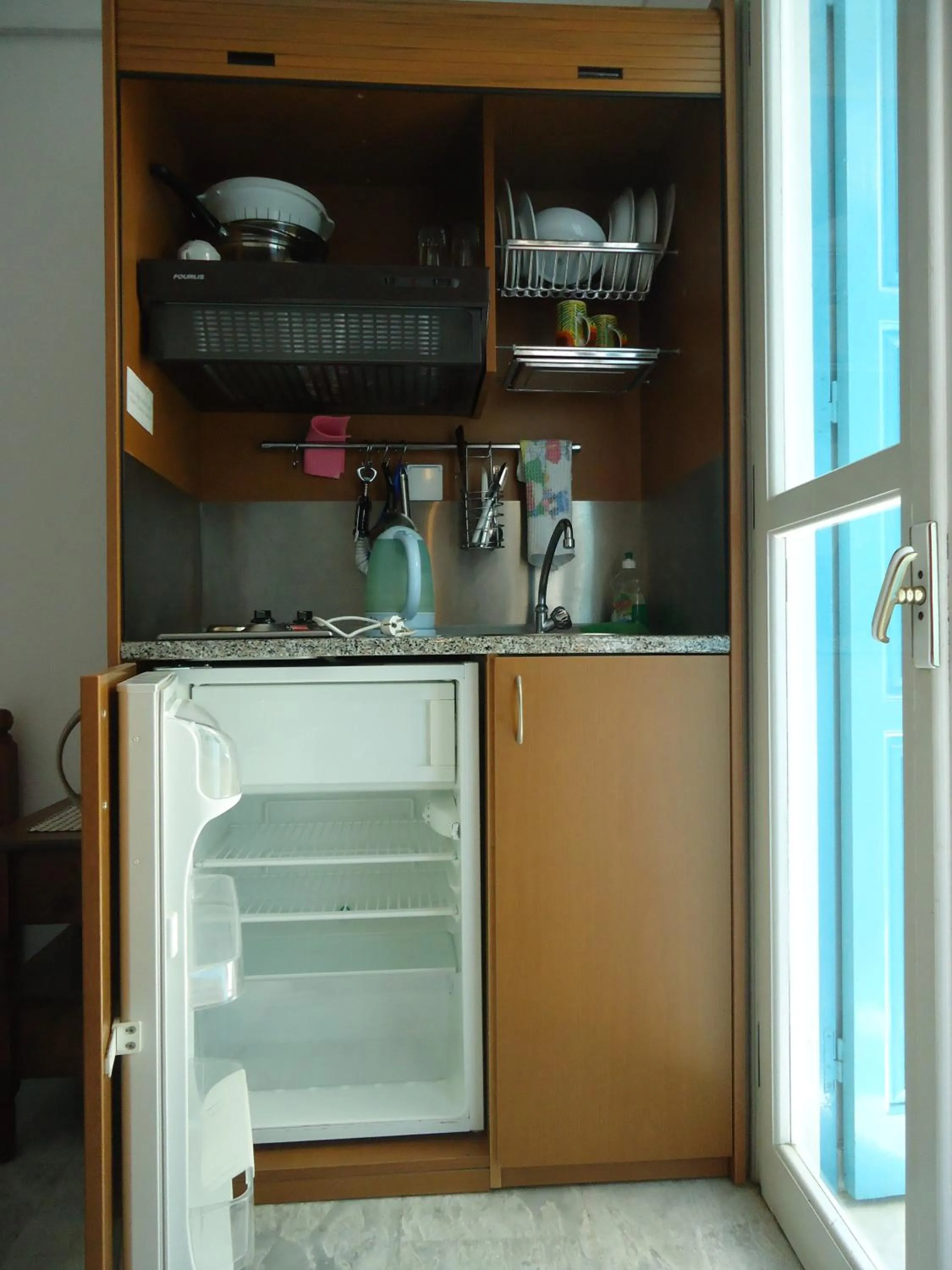Kitchen or kitchenette in Zorbas Hotel