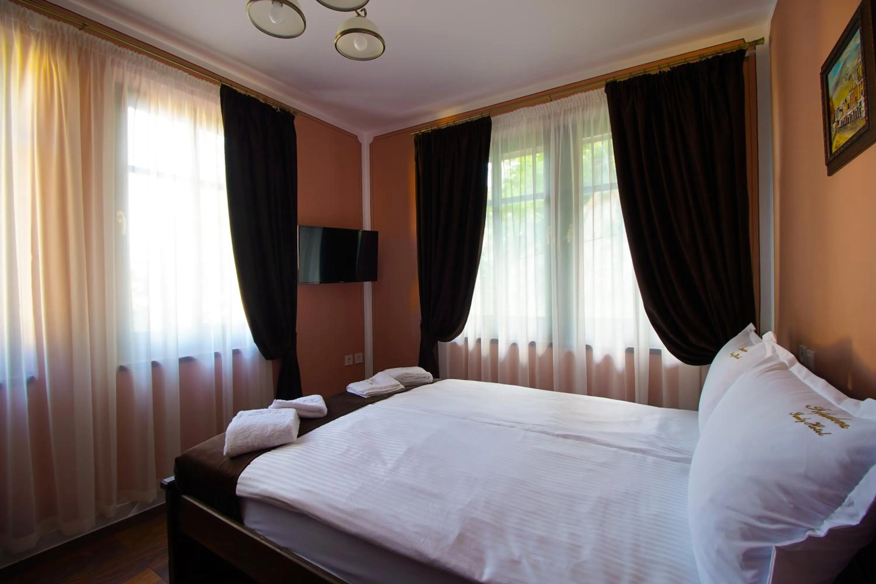 Bed in Pulpudeva Family Hotel