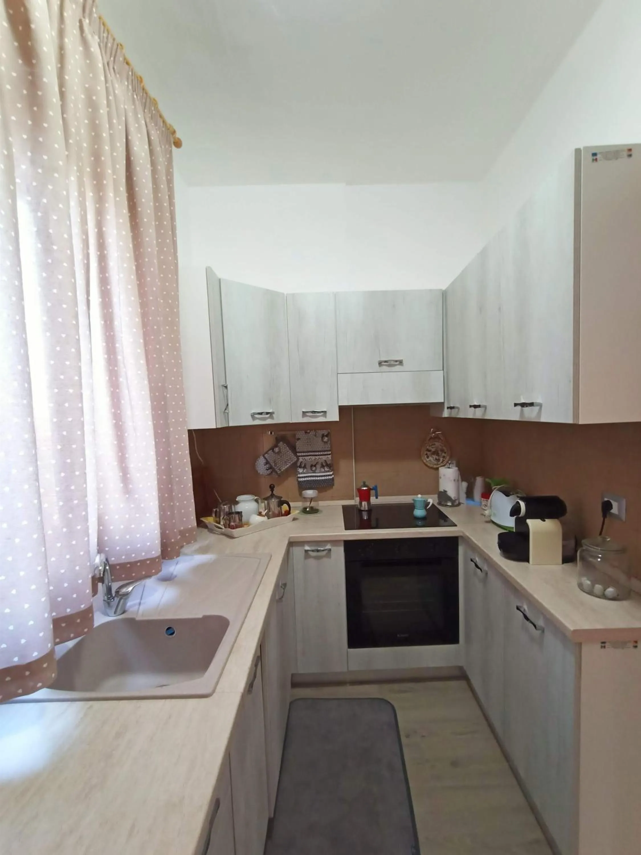 Kitchen or kitchenette in B&B Villa Sara Falconara