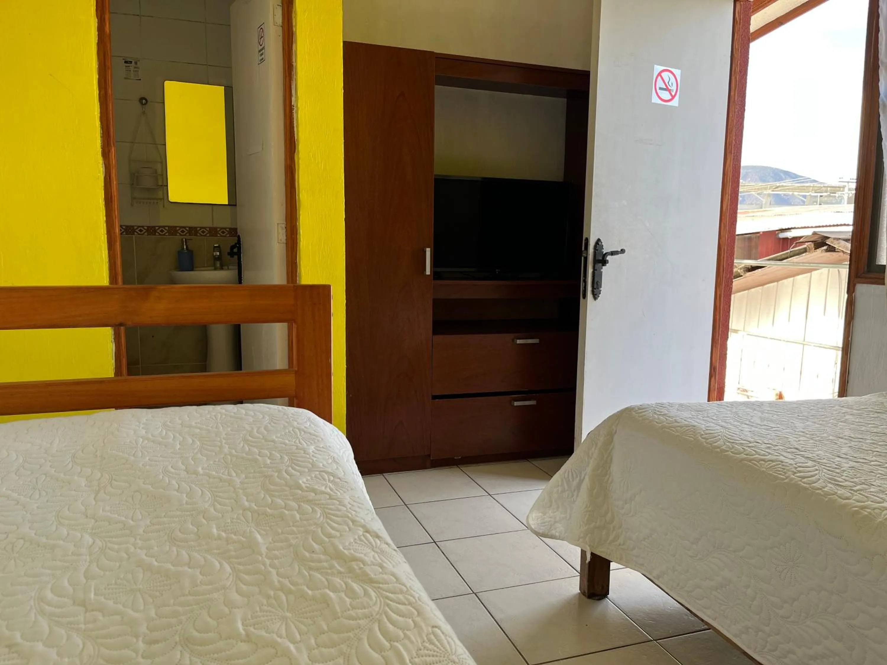 Photo of the whole room, Bed in Hostal Avenue