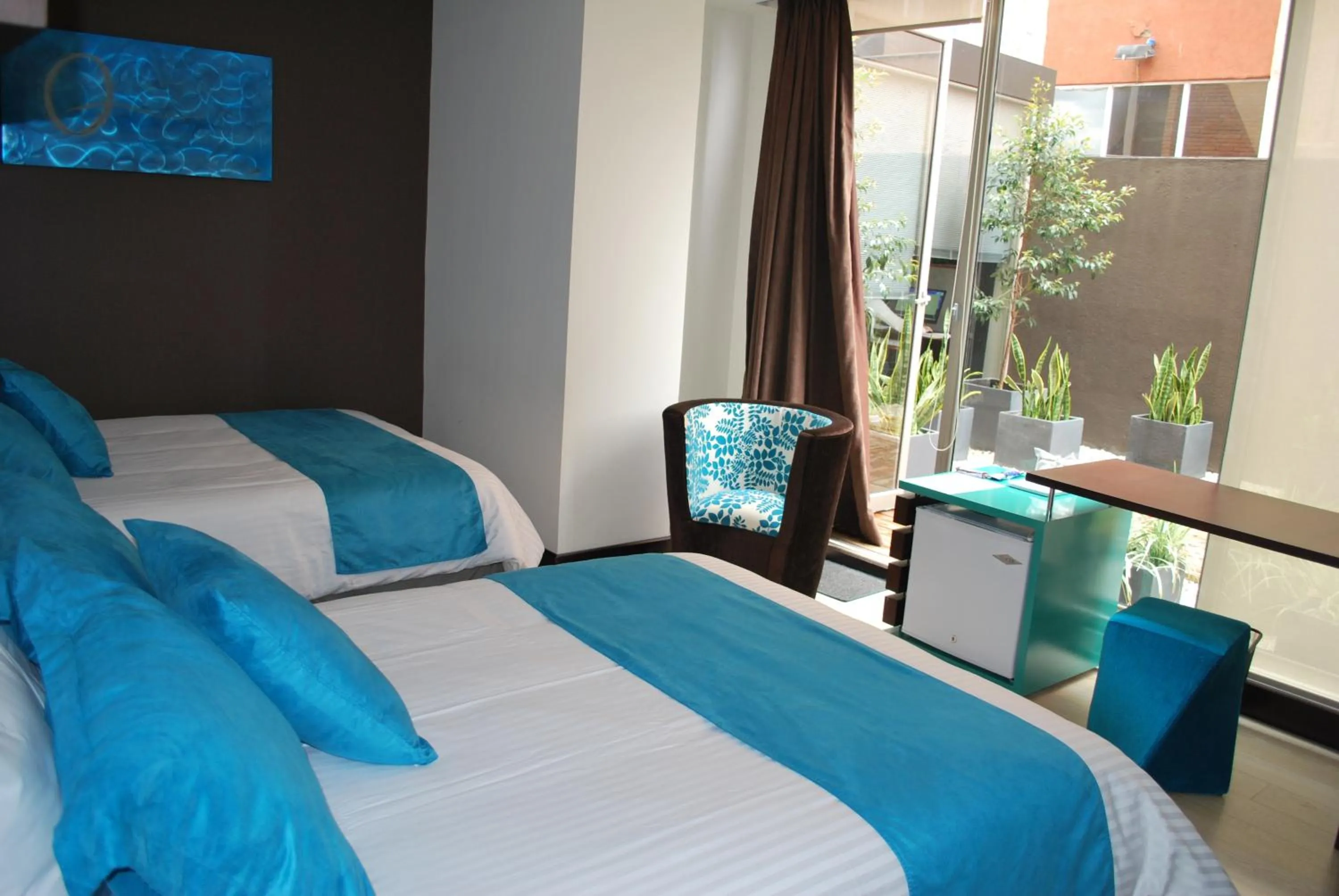 Bed in Rioné Hotel Boutique