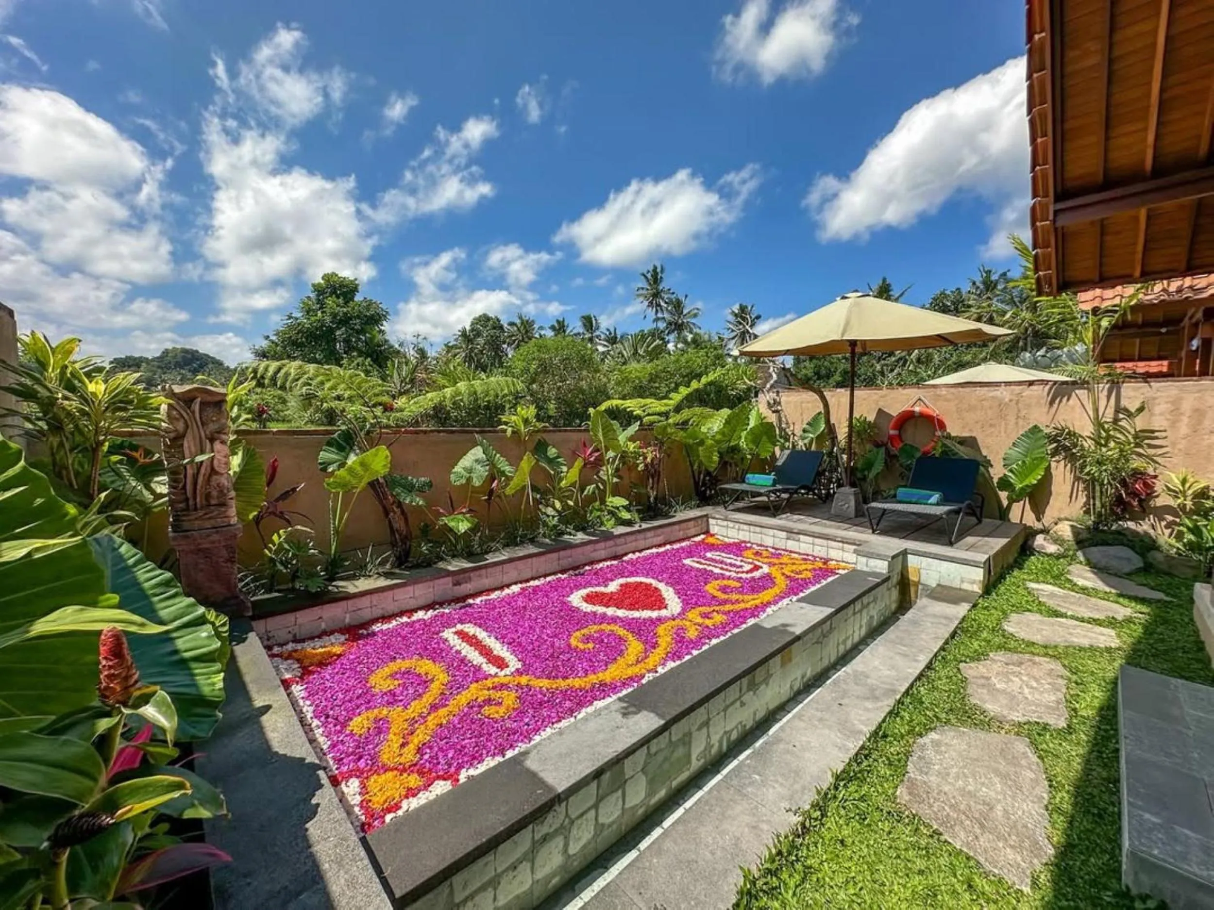 Swimming pool in Santris Villas by GenuineHost