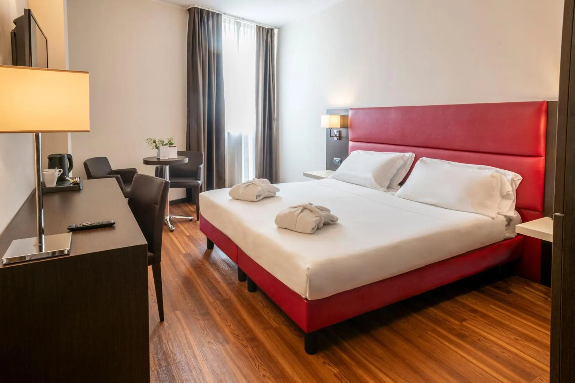 Bed in Kona Hotel Verona by Kleos Group Collection