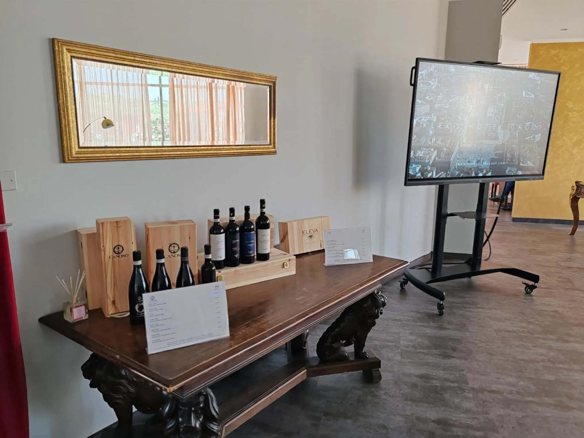 Communal lounge/ TV room in Kona Hotel Verona by Kleos Group Collection