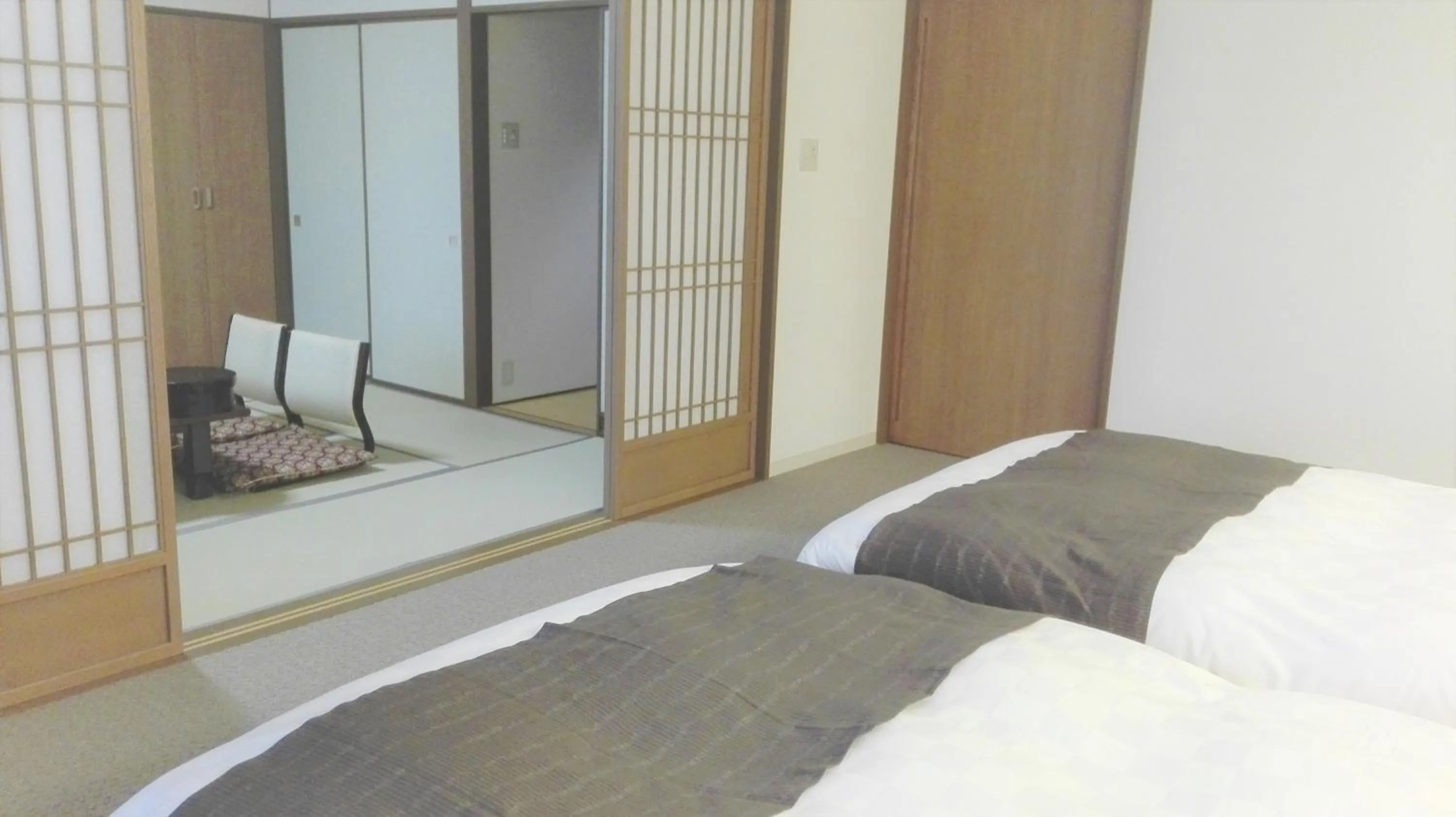 Bed in Hotel Mahoroba