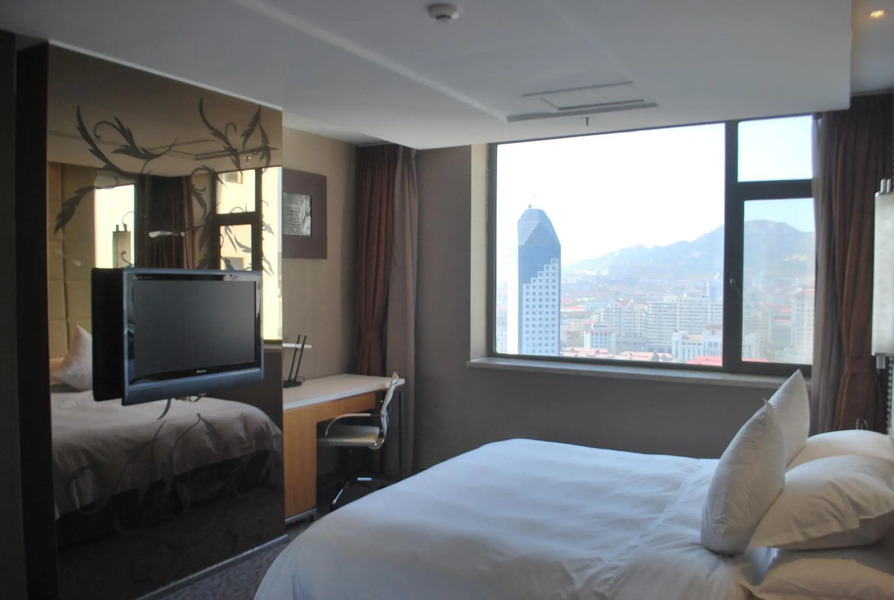 Bed in The Center Hotel Weihai Bed in The Center Hotel Weihai