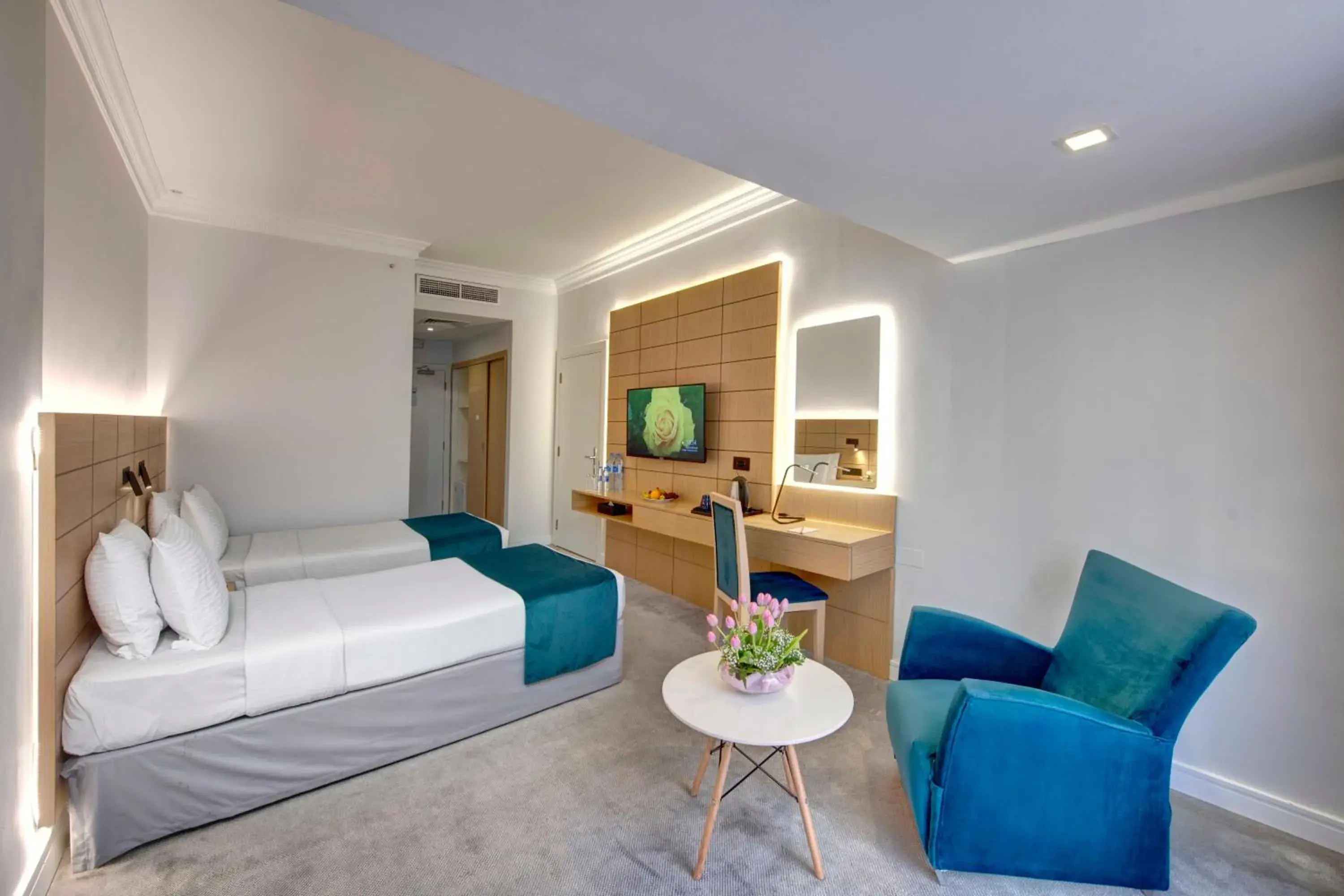 Communal lounge/ TV room, Bed in Lotus Grand Hotel Communal lounge/ TV room, Bed in Lotus Grand Hotel