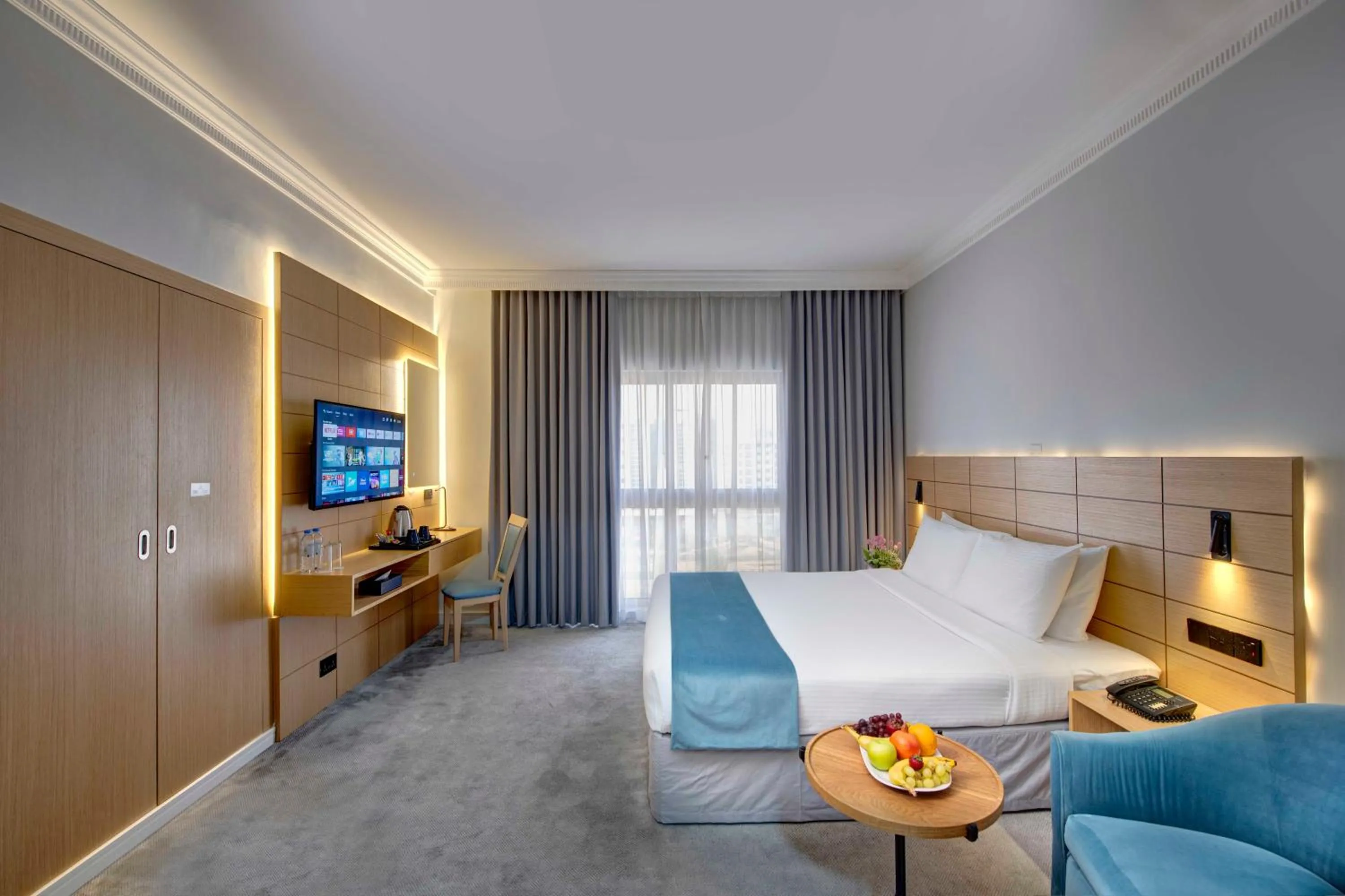 Living room, Bed in Lotus Grand Hotel