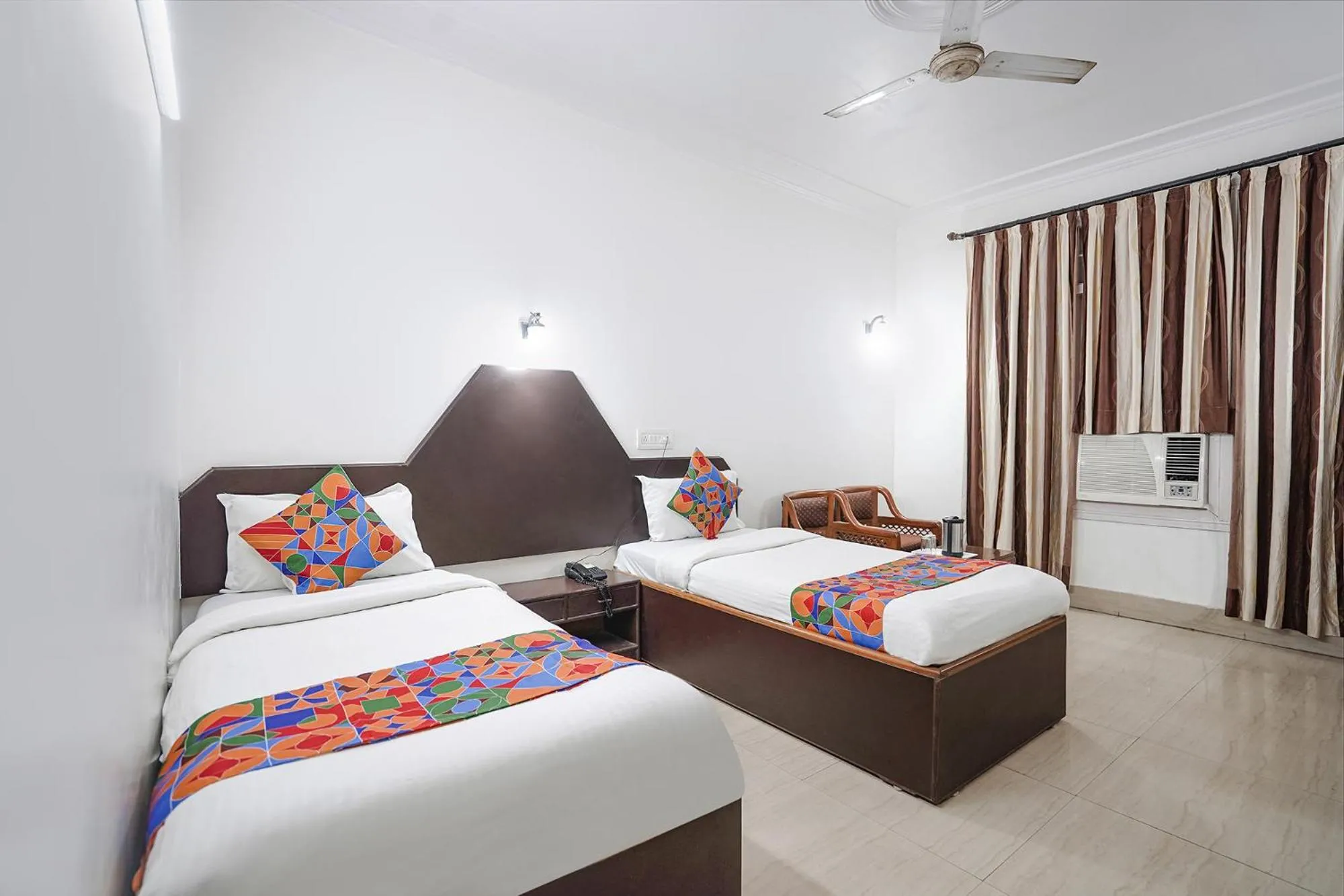 Bed in FabHotel India International