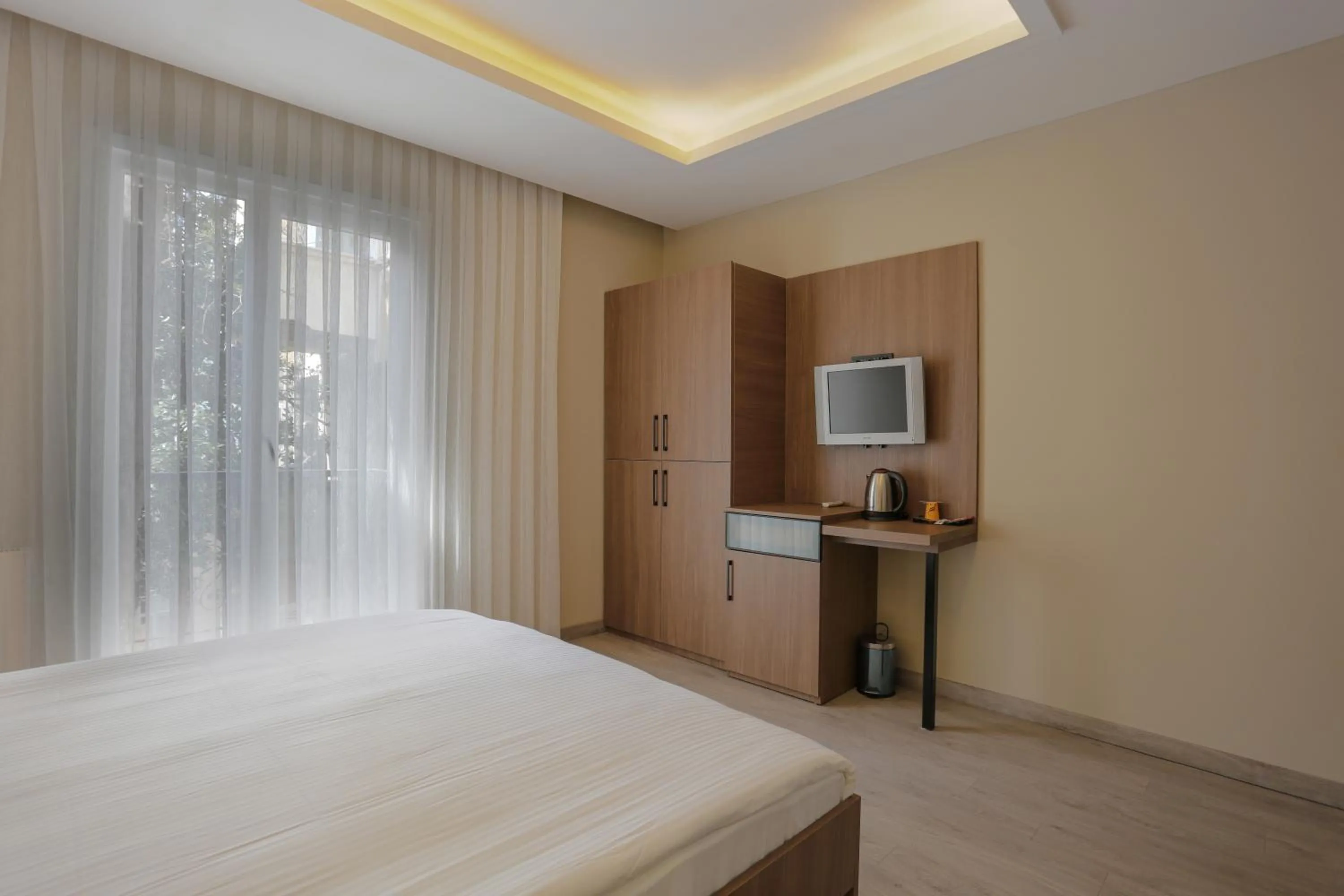 Communal lounge/ TV room, Bed in Arach Hotel Harbiye