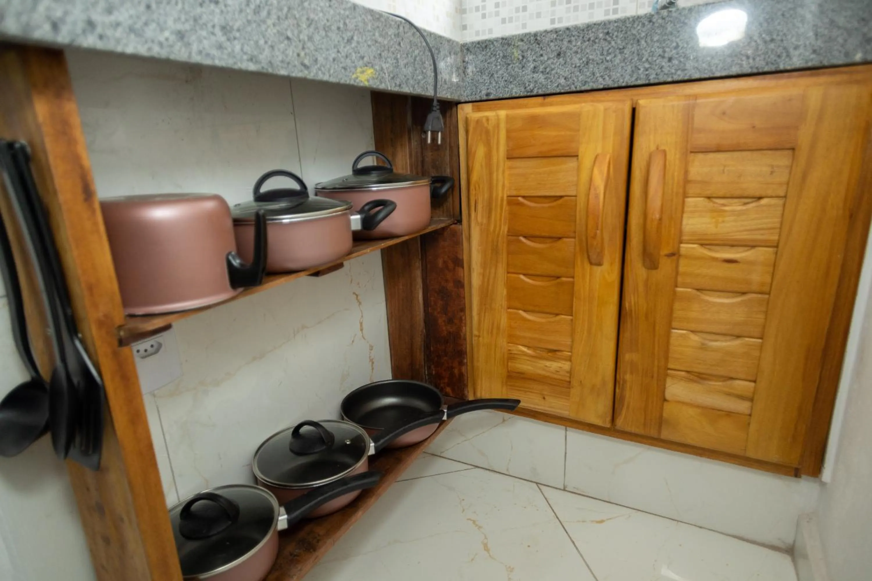 Kitchen or kitchenette in Pousada Flor do Arraial