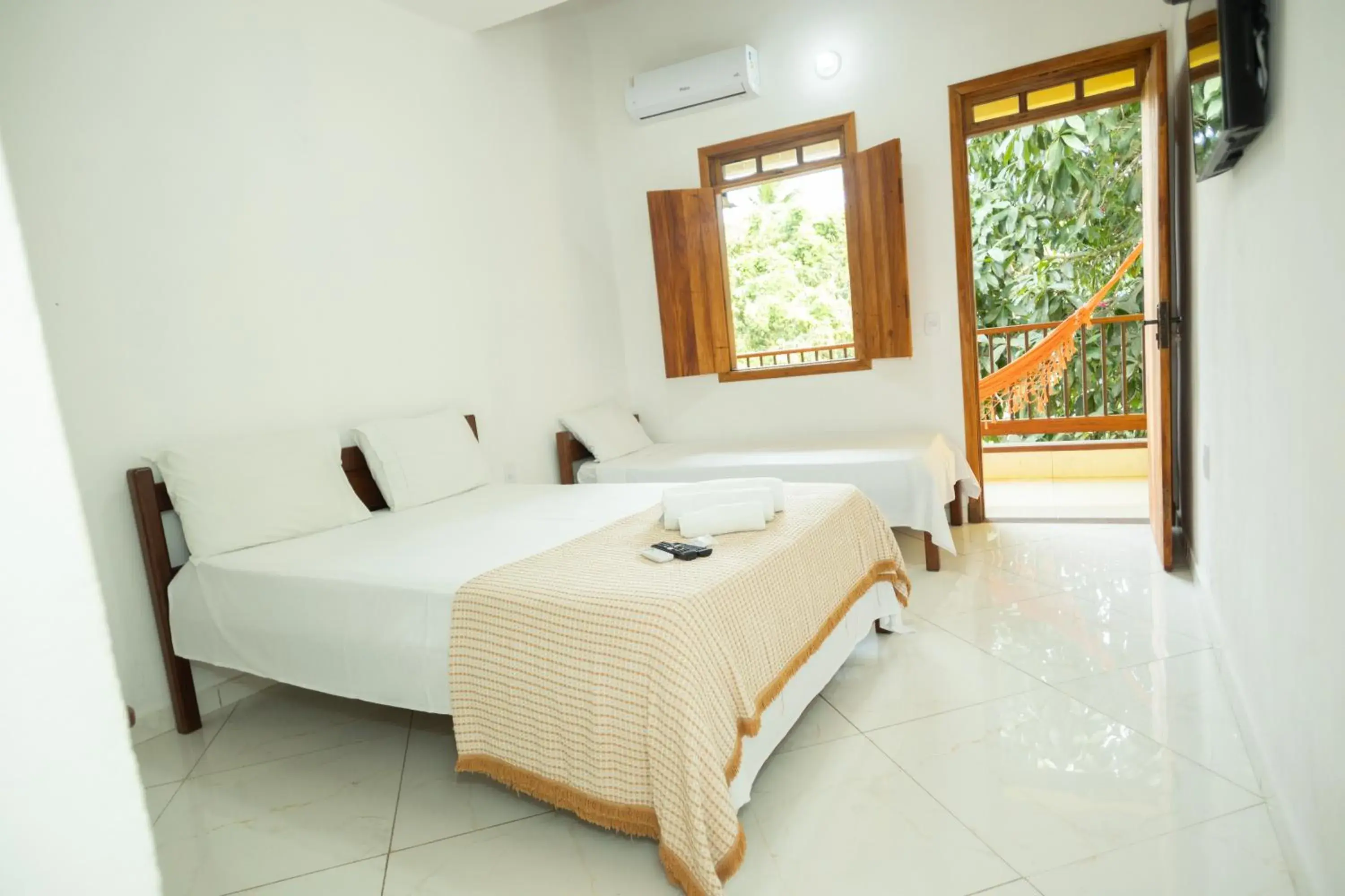 Deluxe Triple Room in Pousada Flor do Arraial Deluxe Triple Room in Pousada Flor do Arraial