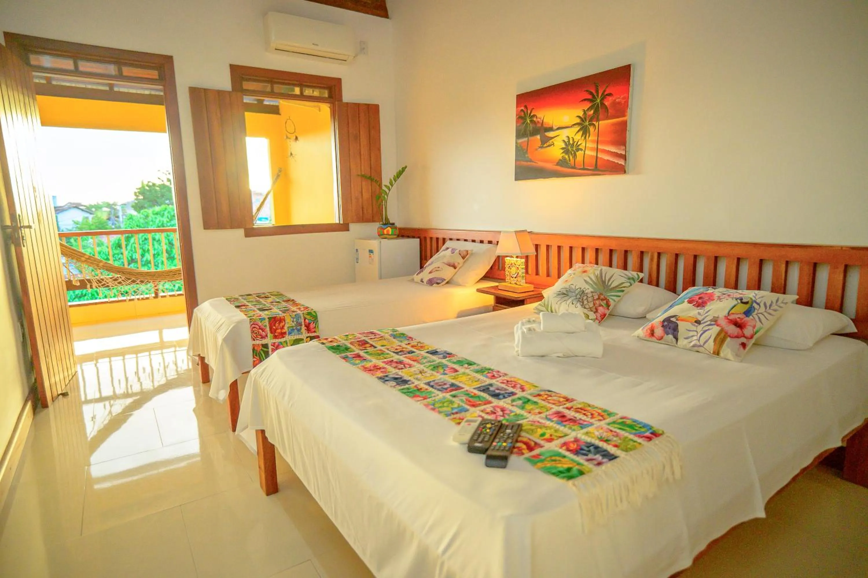 Bed in Pousada Flor do Arraial