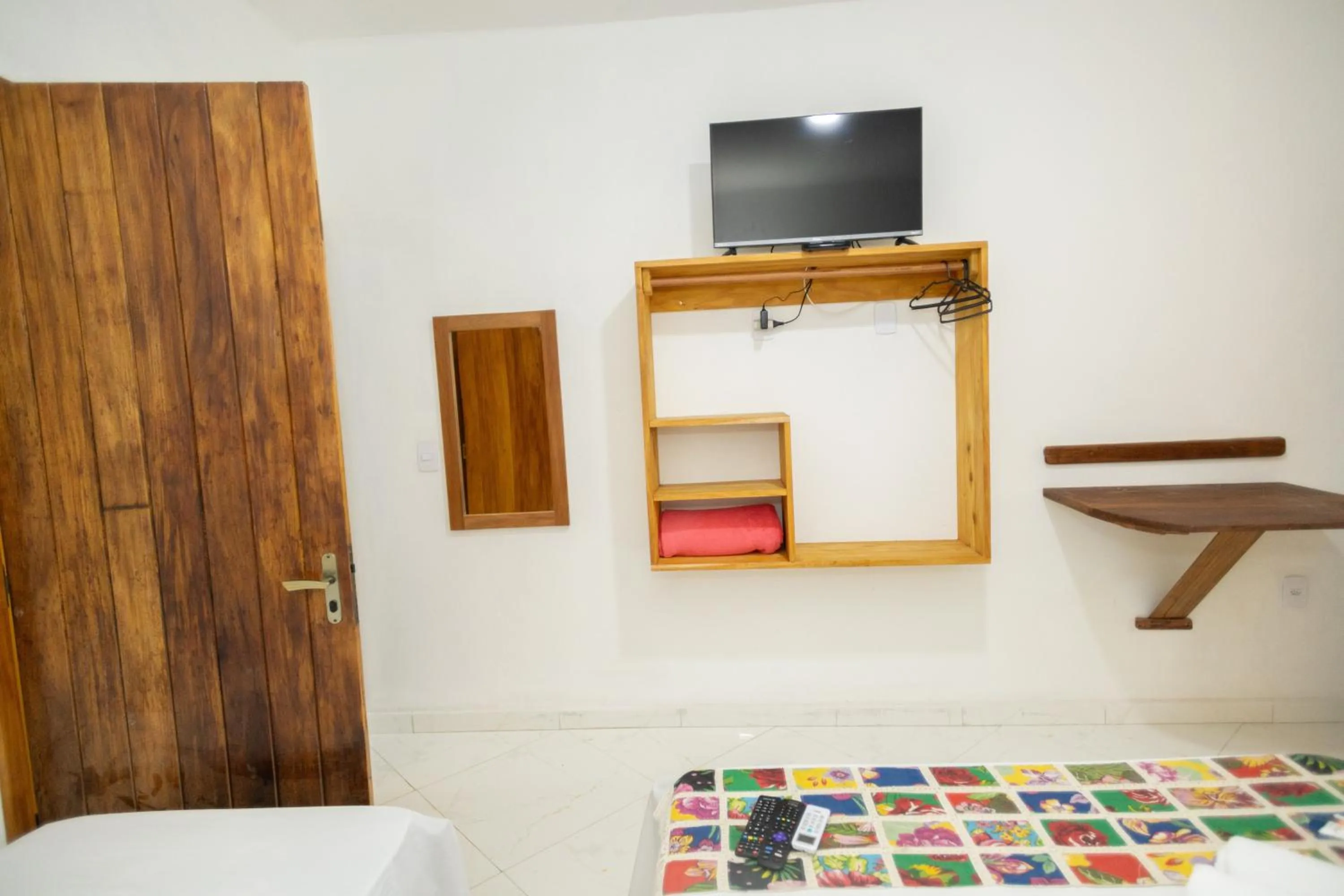 Bed in Pousada Flor do Arraial