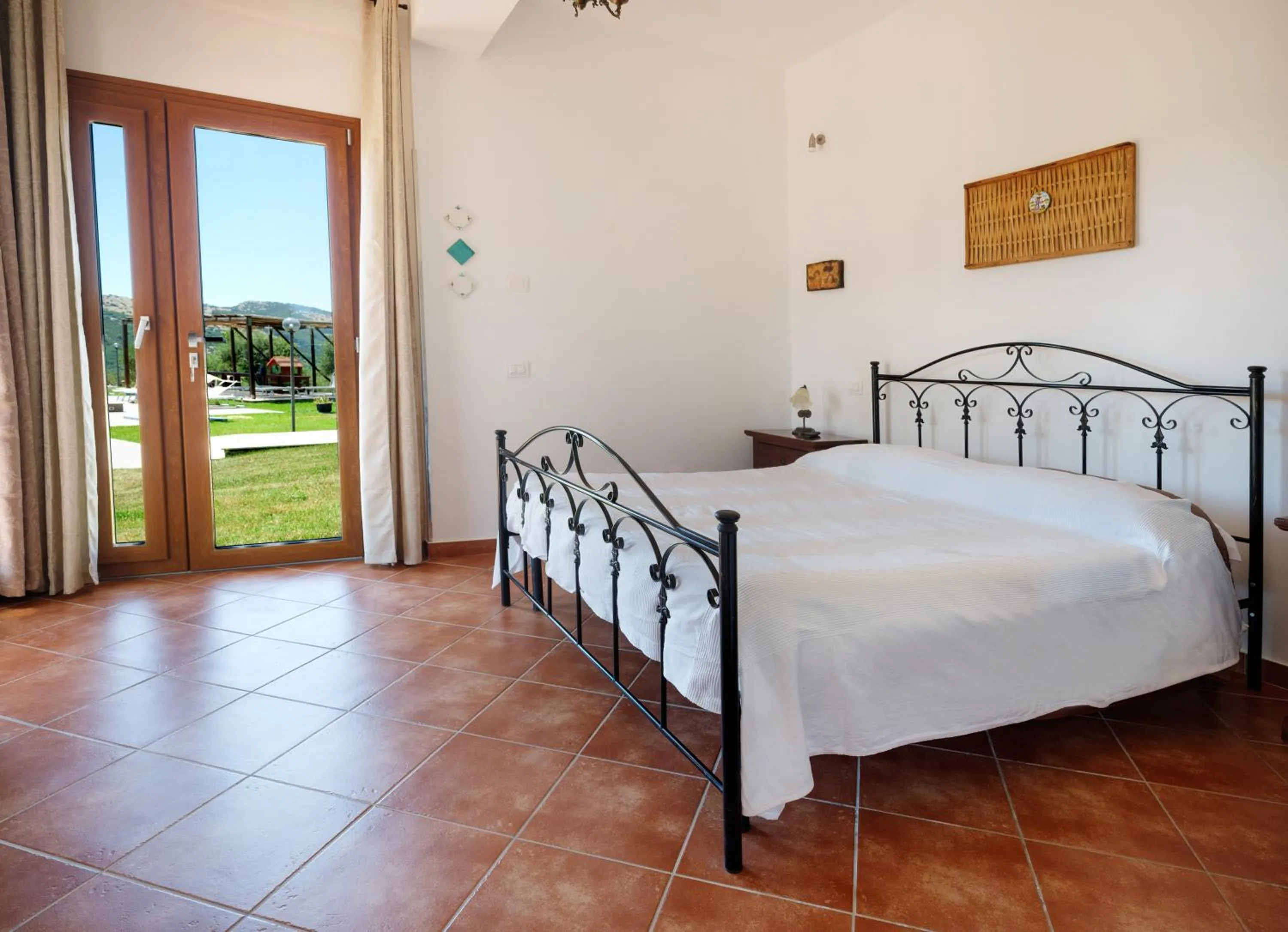 Bed in L' Aia Resort