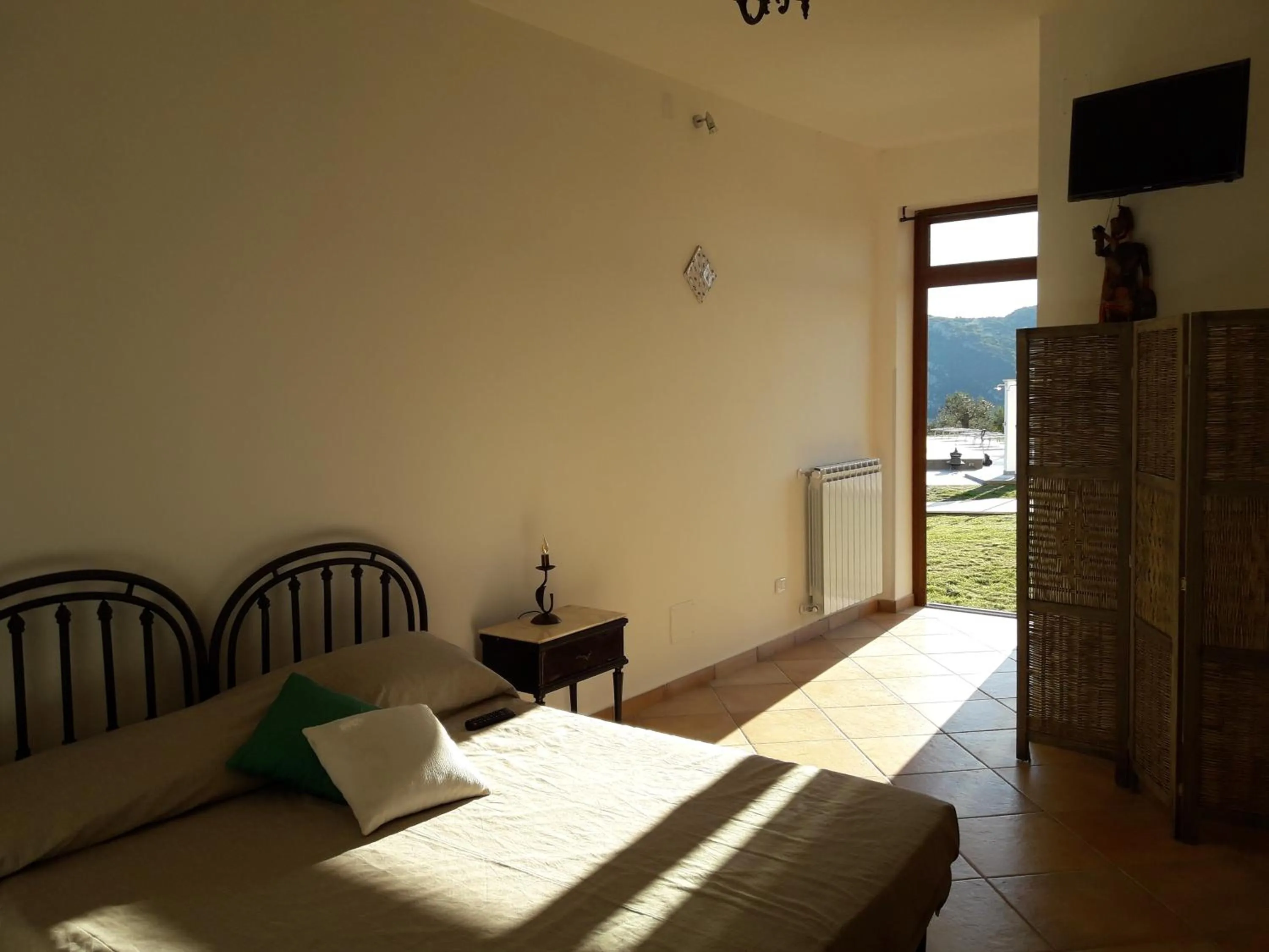 Bed in L' Aia Resort