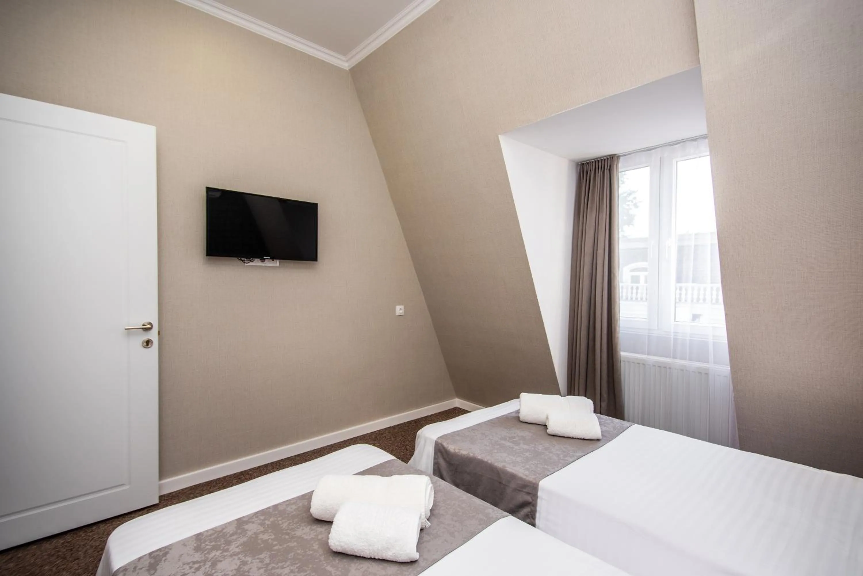 Bed in Margi Boutique Hotel by DNT Group