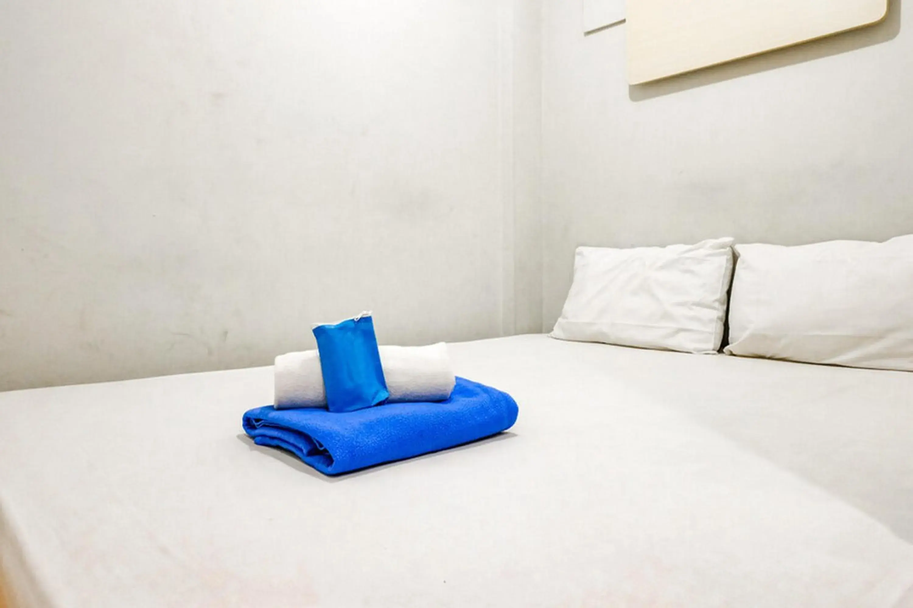 Bed in Marson Interkota Residence Mitra RedDoorz Bed in Marson Interkota Residence Mitra RedDoorz