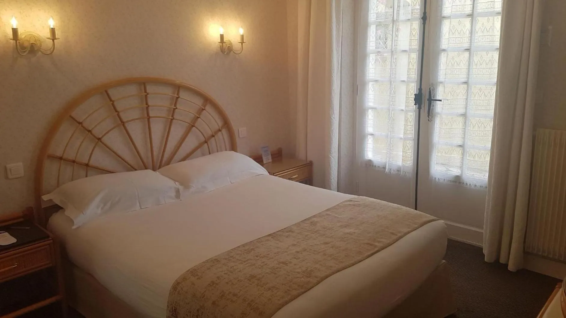 Bed in Hôtel de Charme Brise Marine