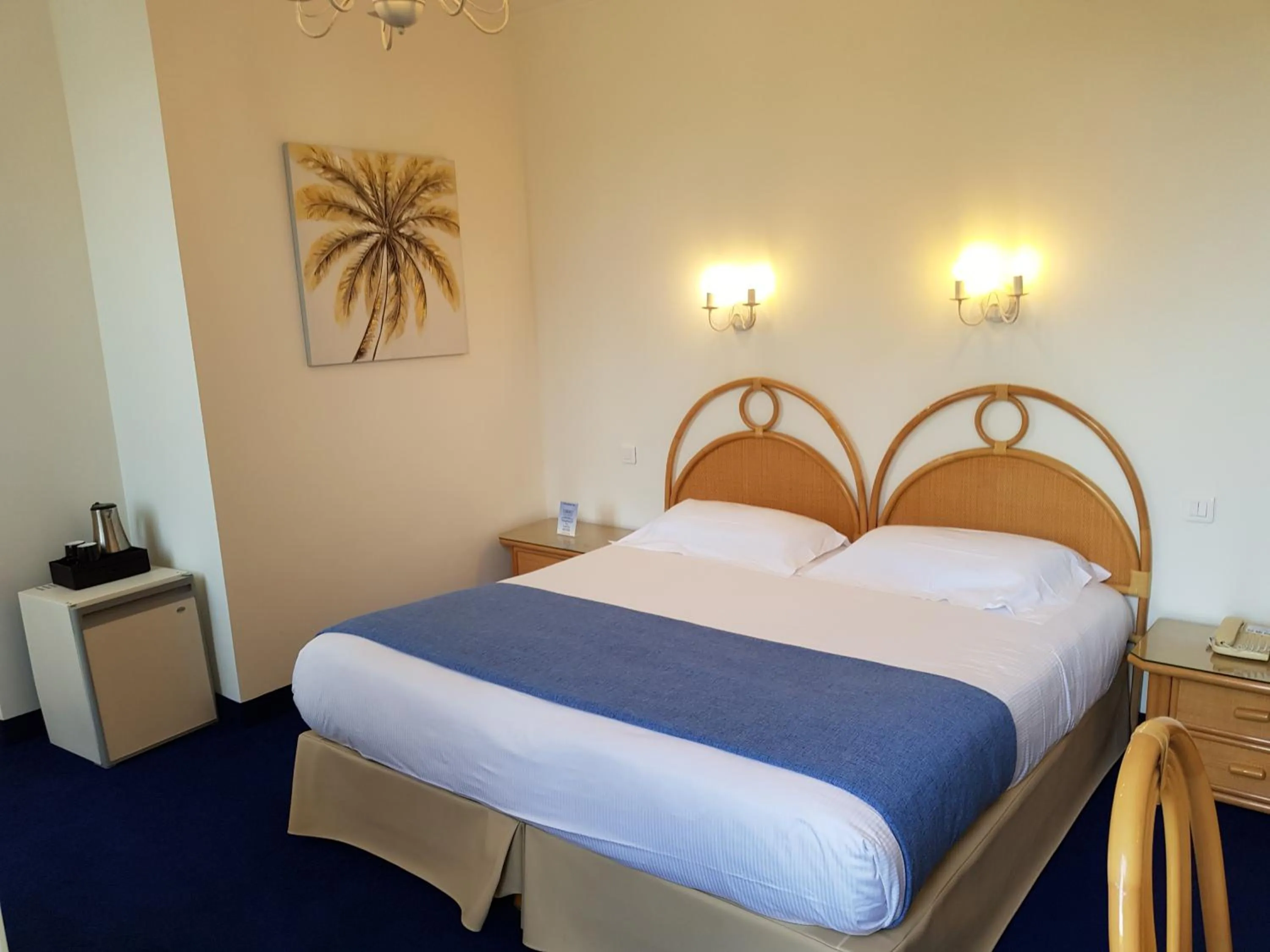 Bed in Hôtel de Charme Brise Marine