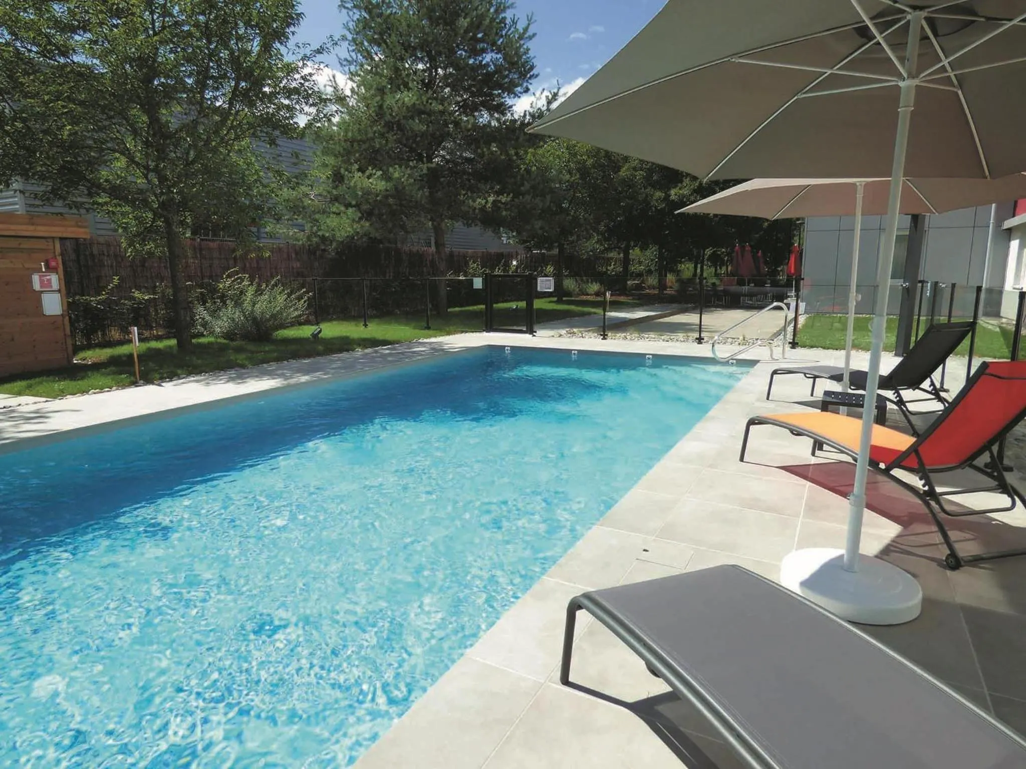 Pool view in Ibis Saint-Genis-Pouilly Genève