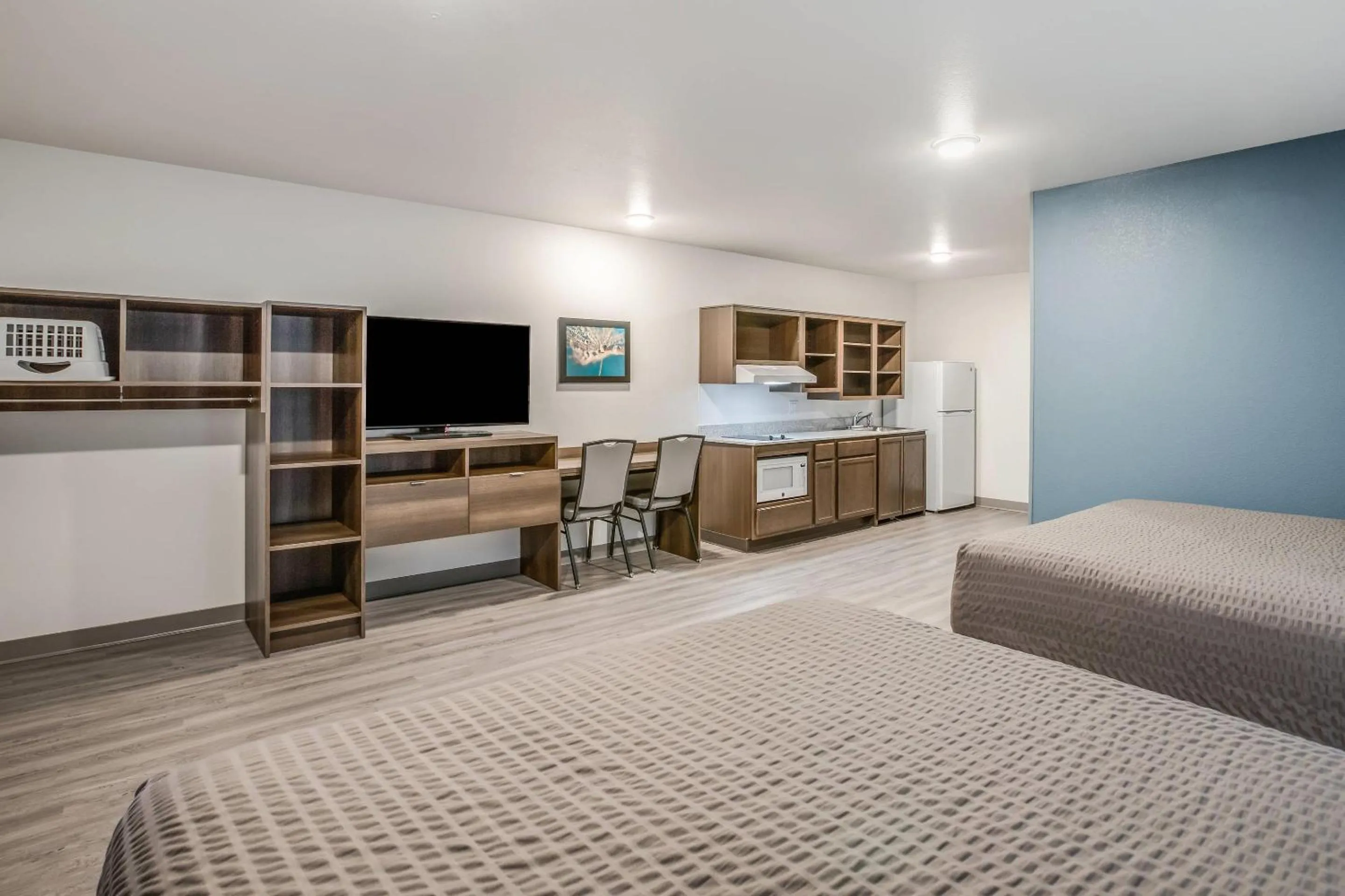 Bedroom, Bed in WoodSpring Suites Novi Farmington