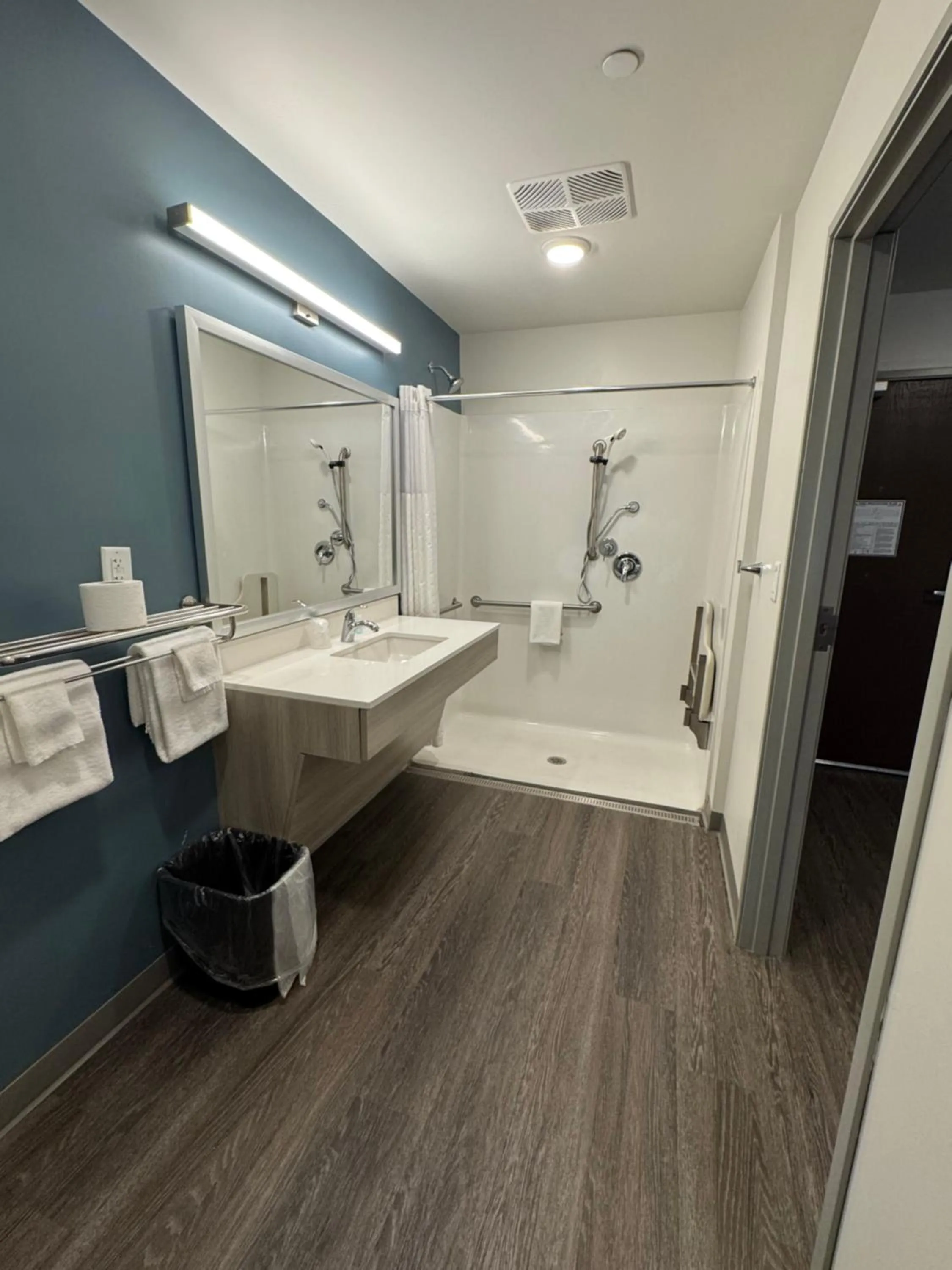 Bathroom in WoodSpring Suites Detroit Farmington Hills