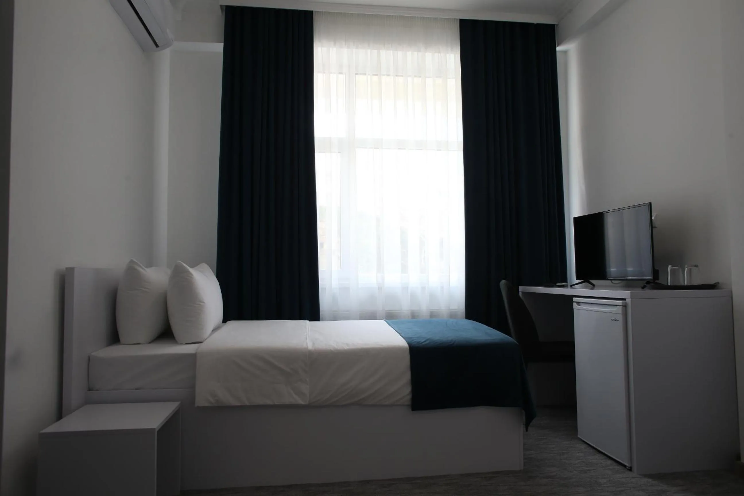 Bed in Glass Cube Hotel