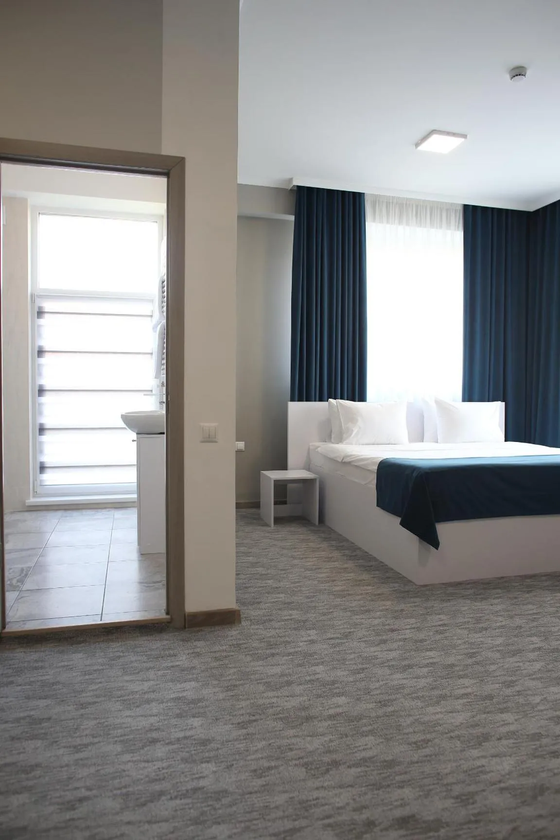 Bed in Glass Cube Hotel