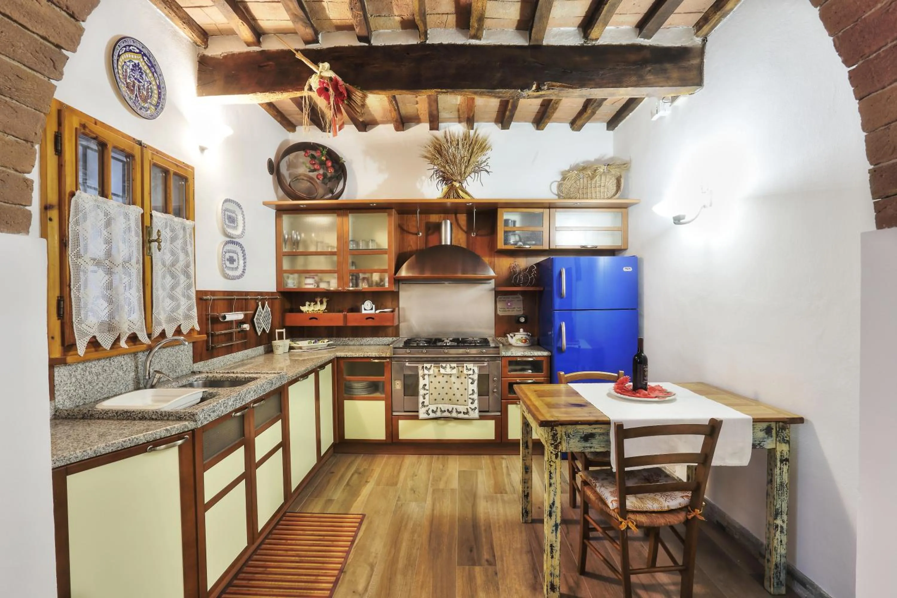 Kitchen or kitchenette in La Suite Toscana