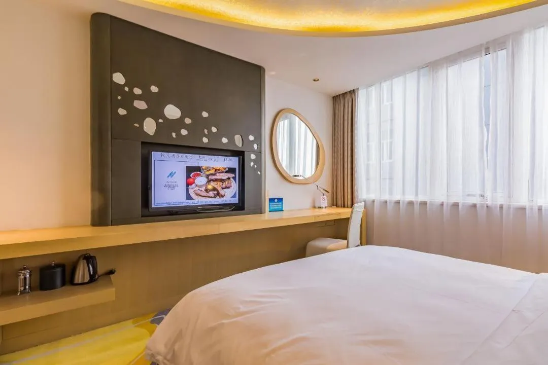 Bed in Beijing Qianyuan Hotel