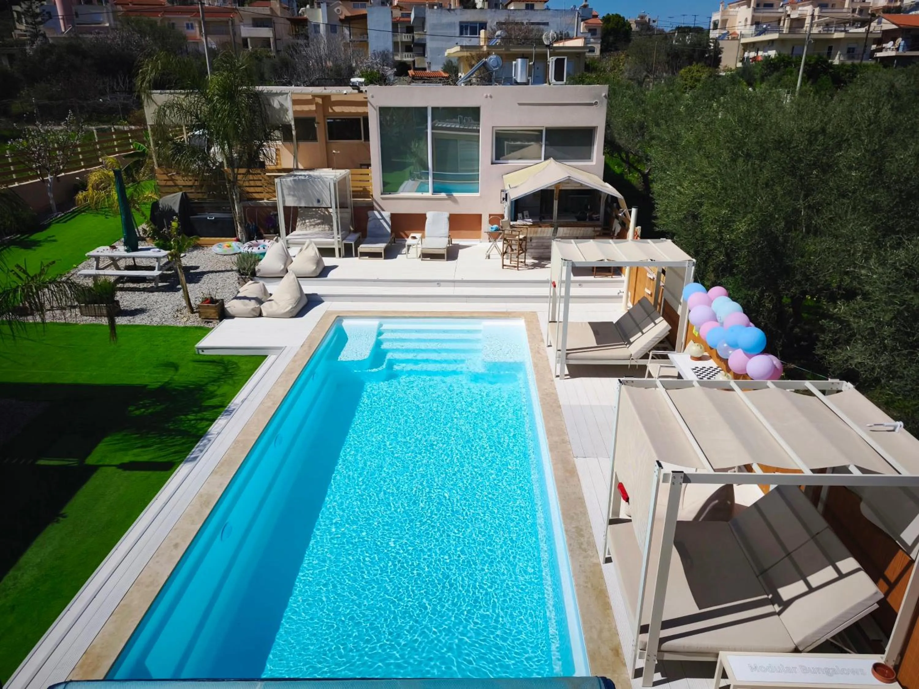 Swimming pool in Modular Bungalows With Heated Pool Artemis Greece