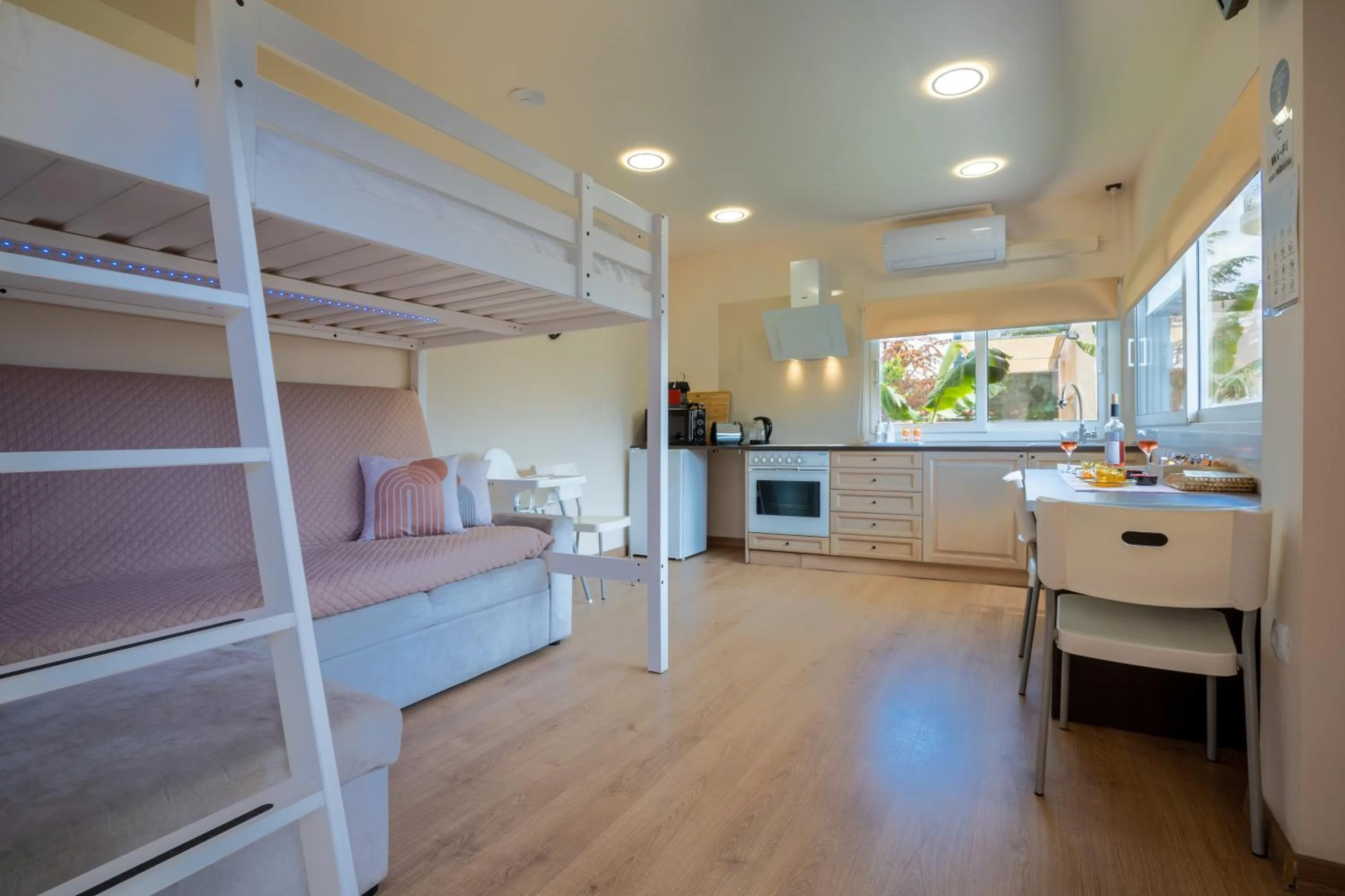 Seating area, Bed in Modular Bungalows With Heated Pool Artemis Greece