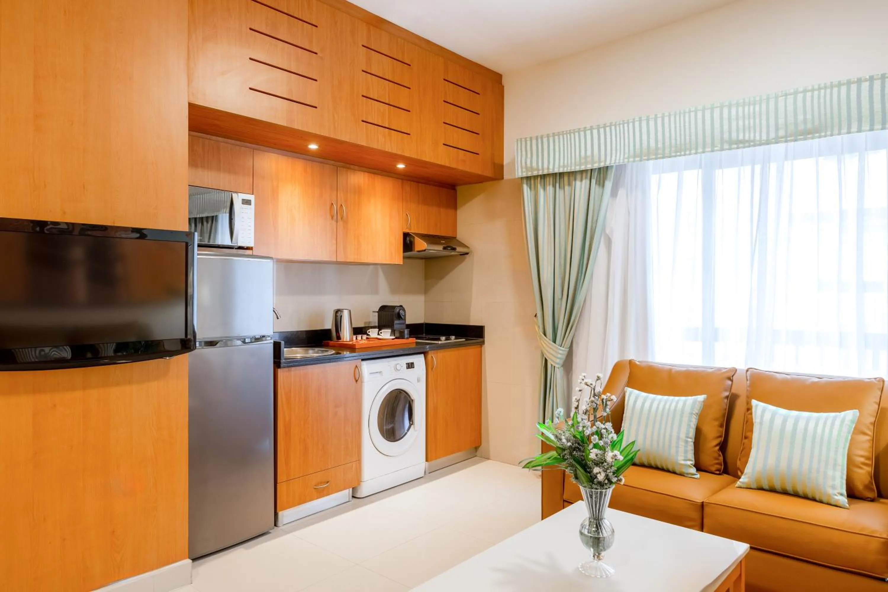 Kitchen or kitchenette in Golden Sands Hotel Apartments