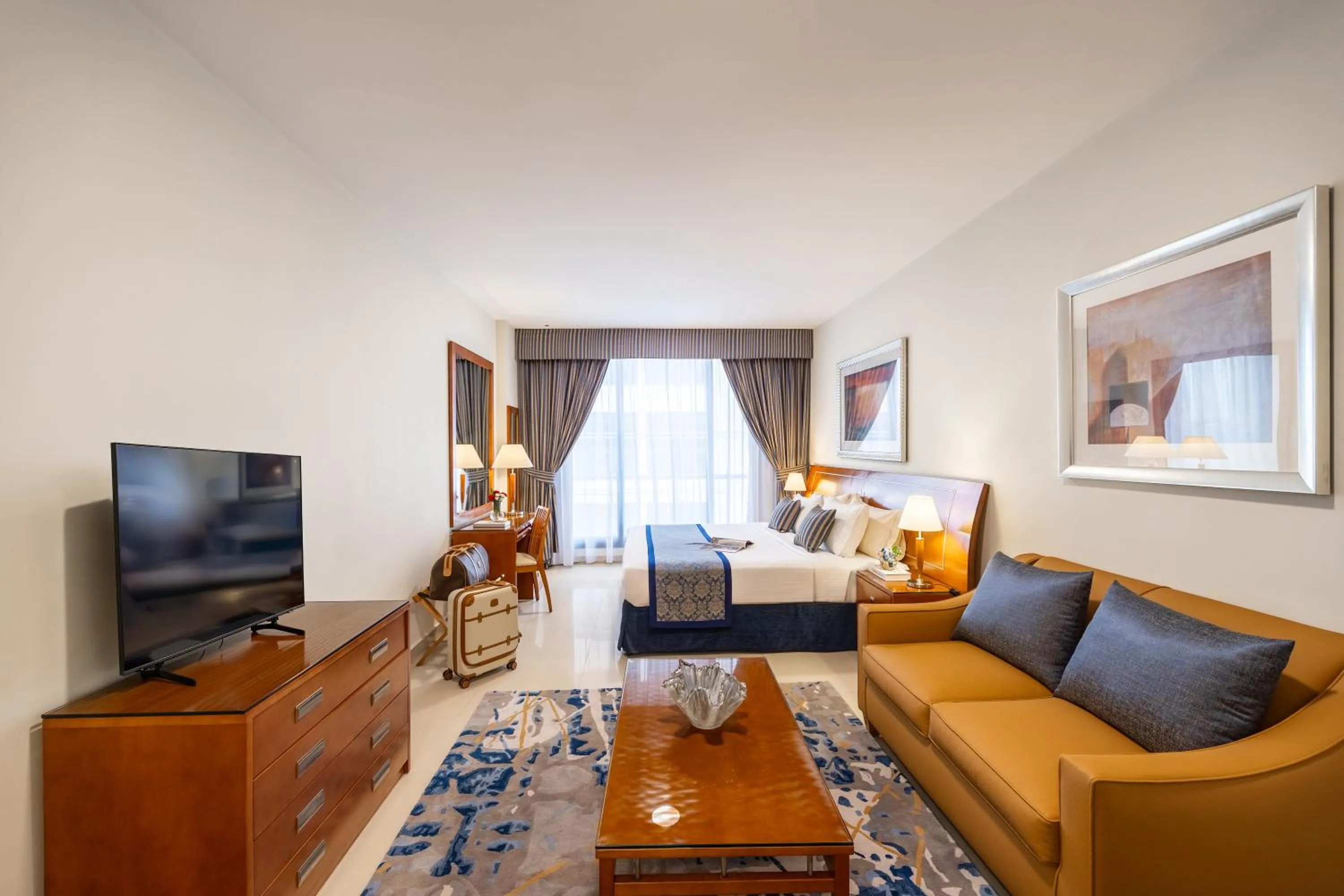 Communal lounge/ TV room in Golden Sands Hotel Apartments