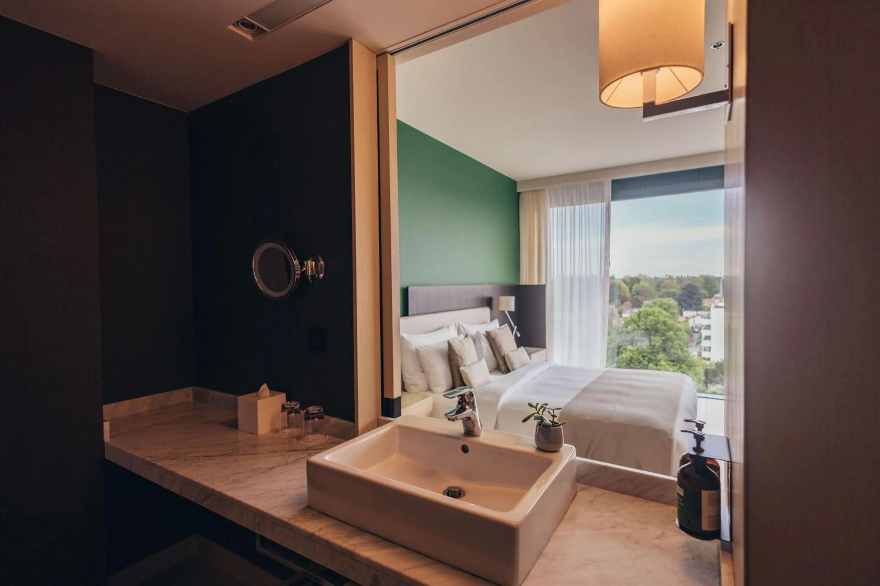 Photo of the whole room, Bed in Crowne Plaza Geneva by IHG