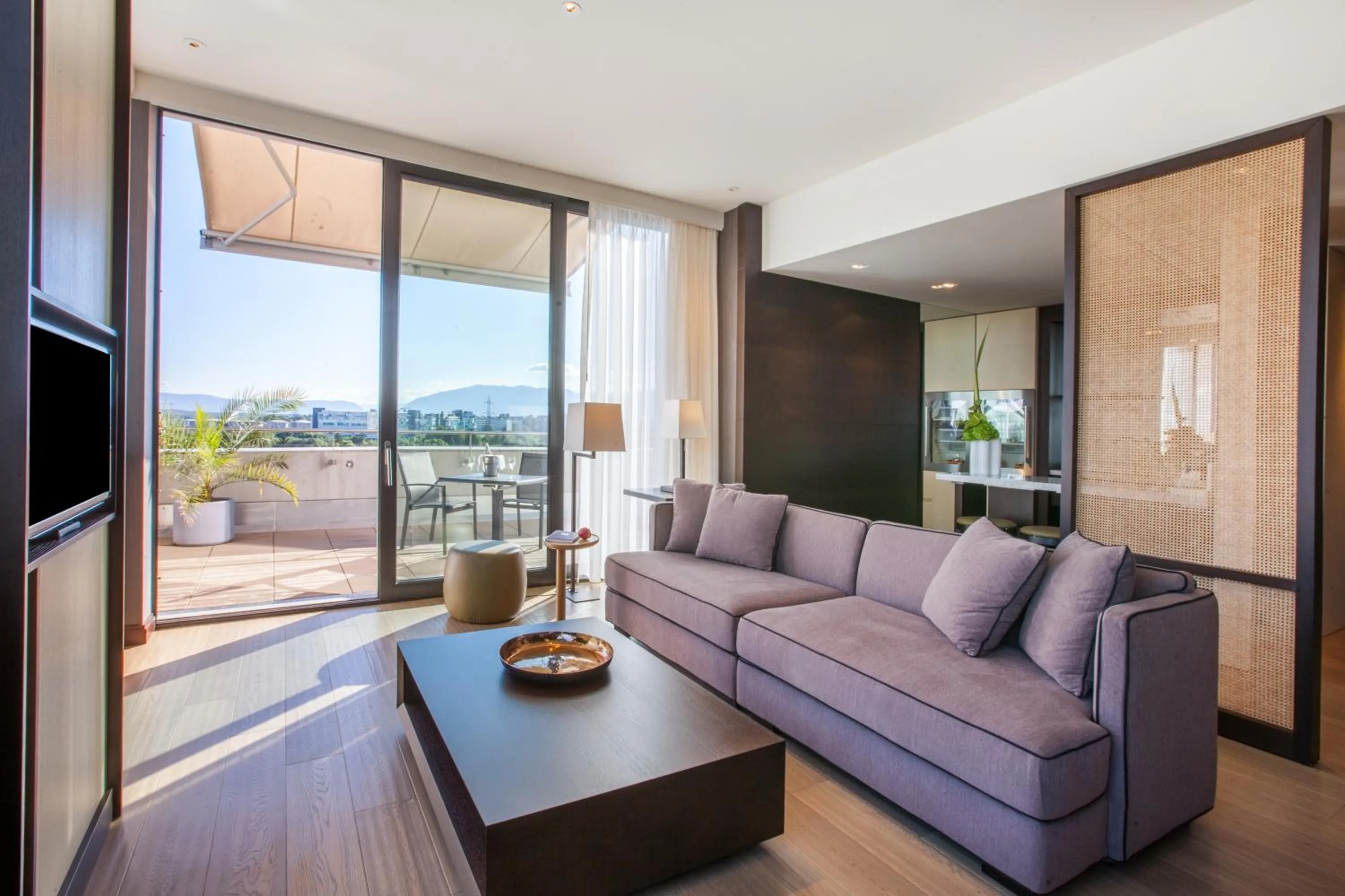 Living room in Crowne Plaza Geneva by IHG