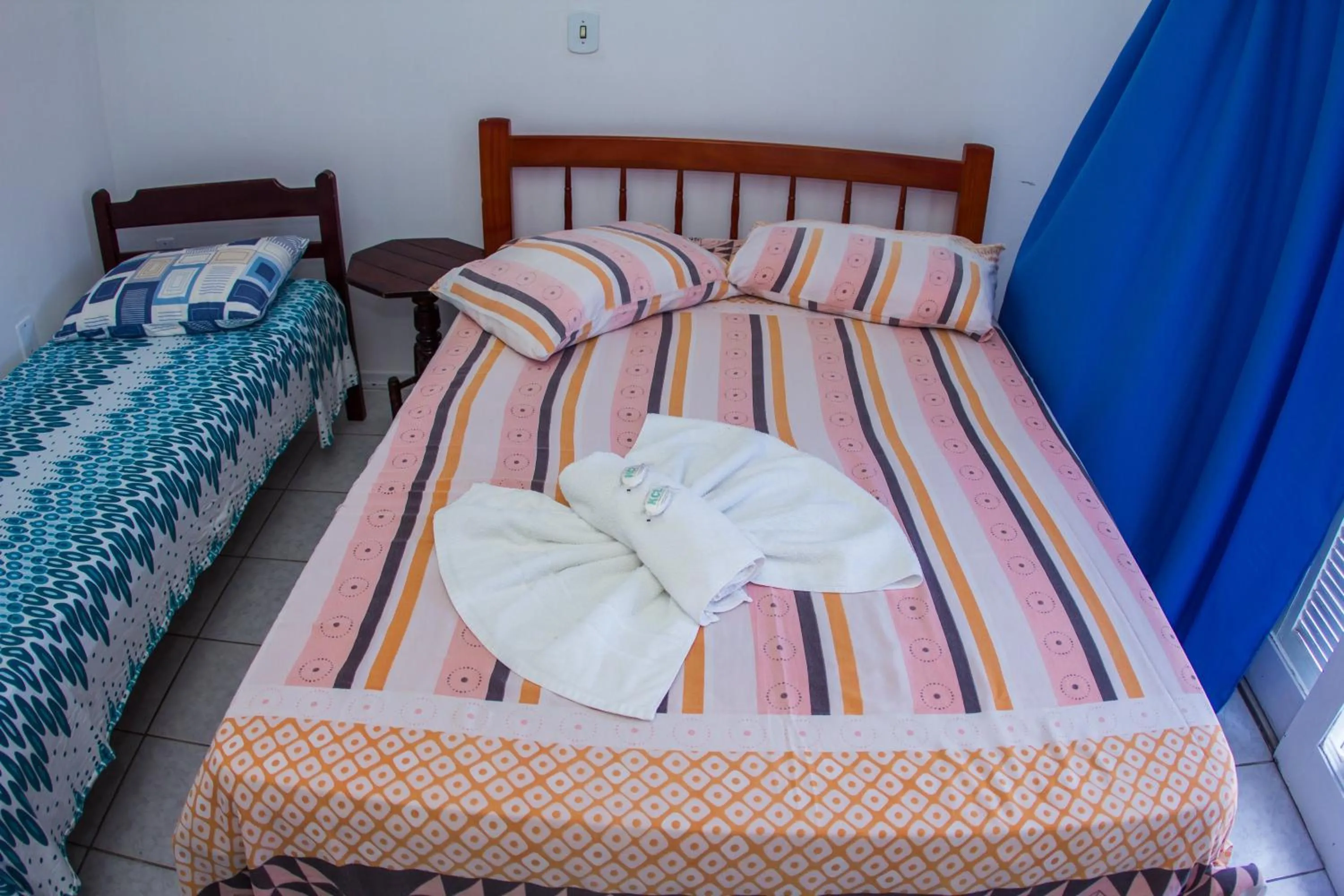 Bed in Hotel Recanto do Mar