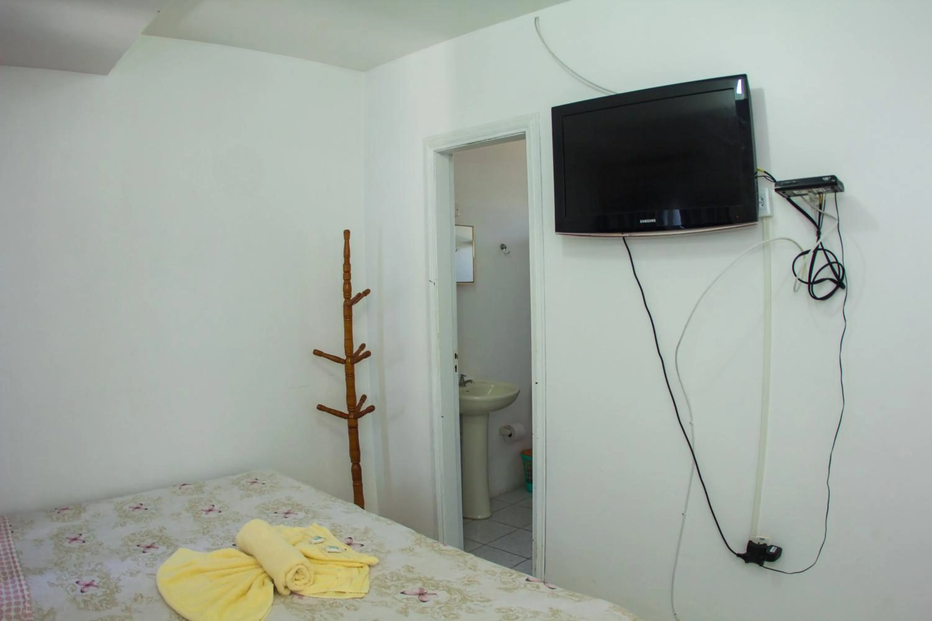 Bed in Hotel Recanto do Mar