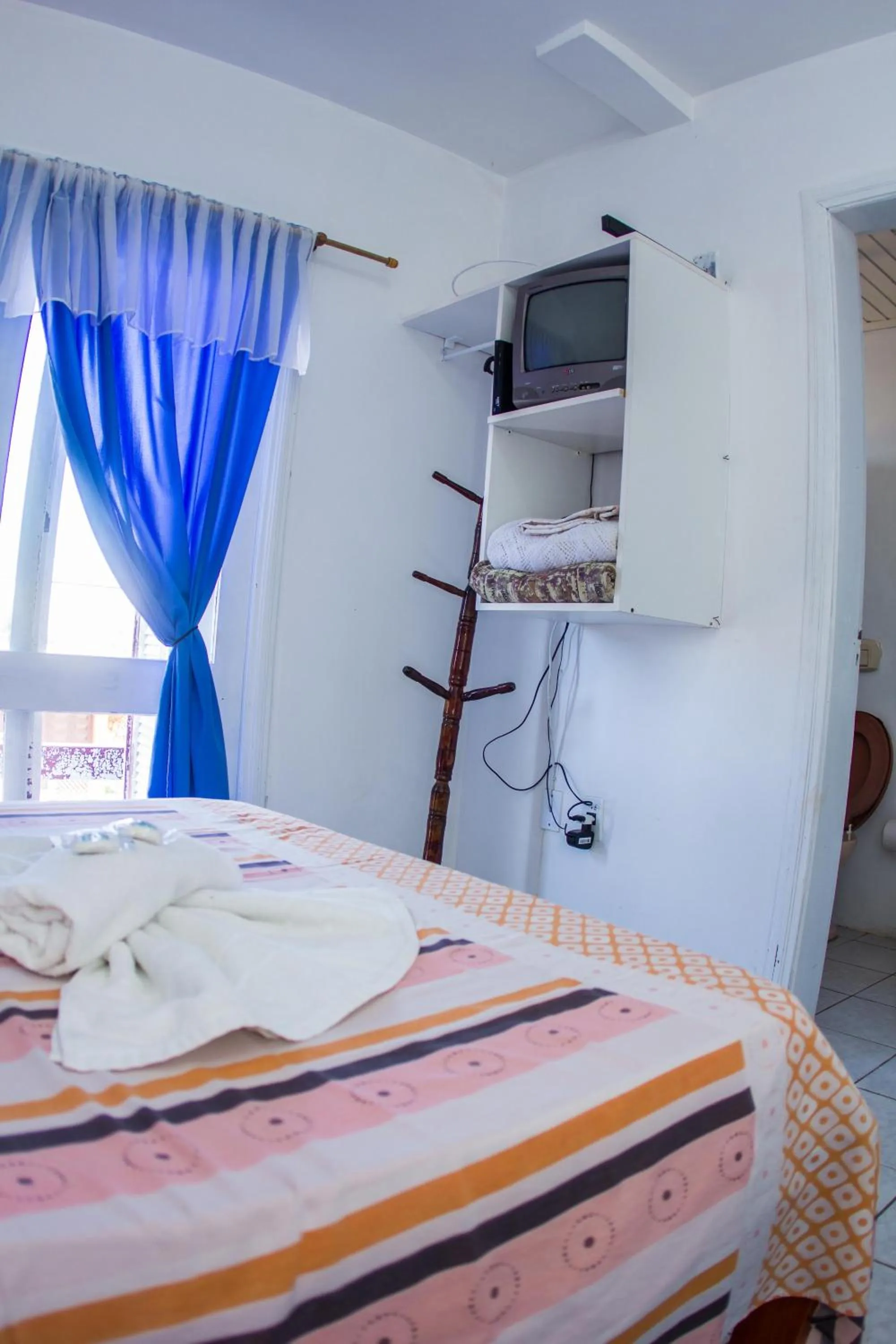 Bed in Hotel Recanto do Mar