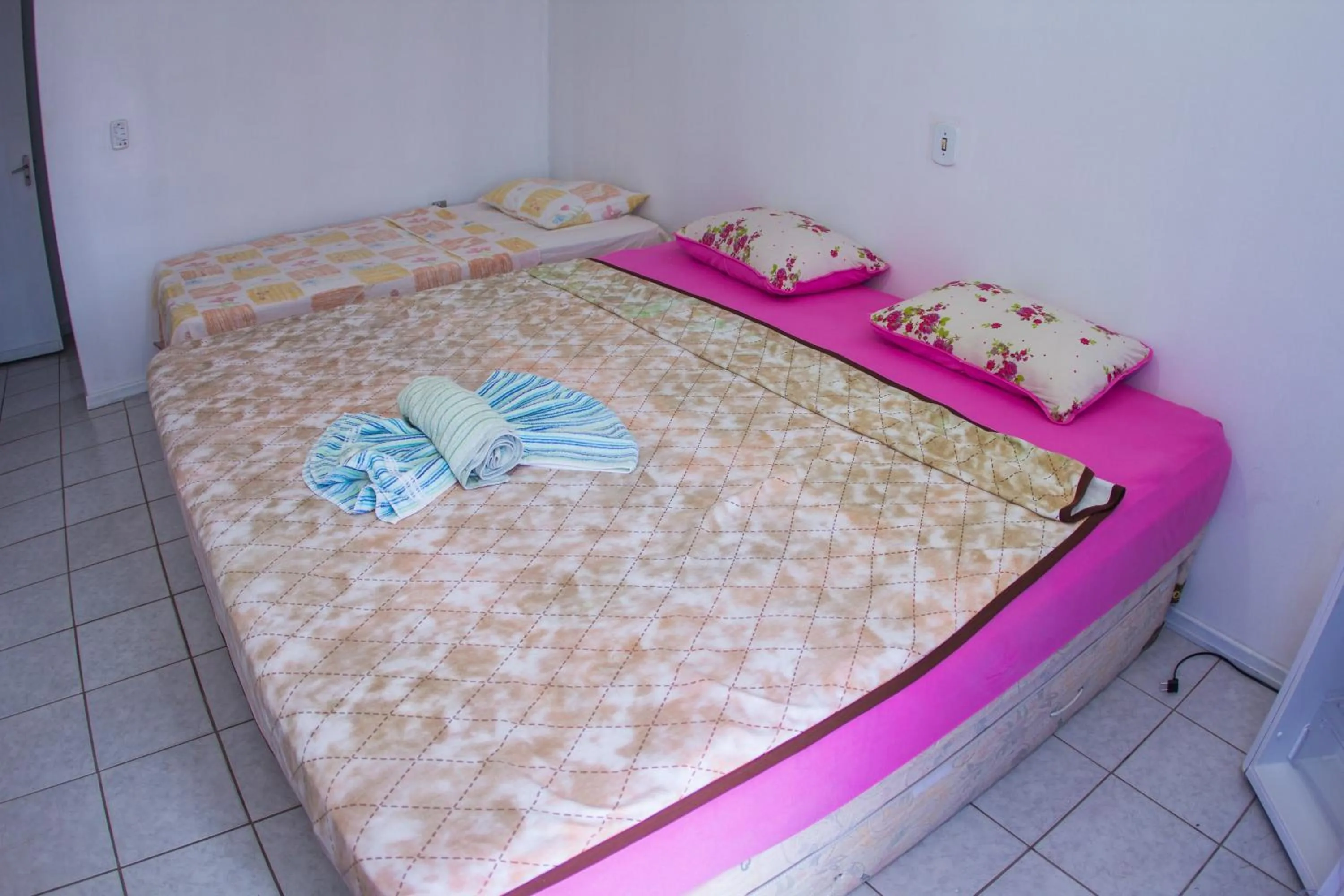 Bed in Hotel Recanto do Mar