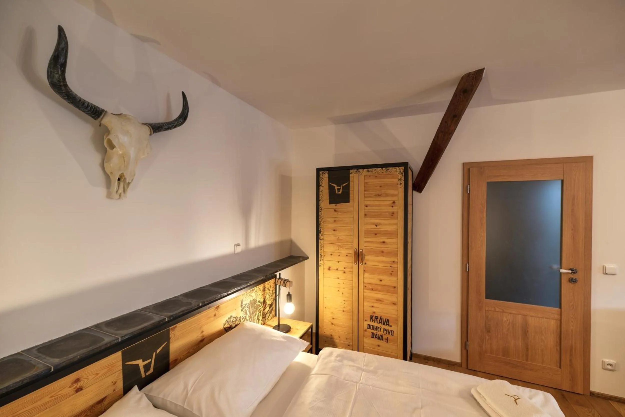 Bed in Pivní Hotel