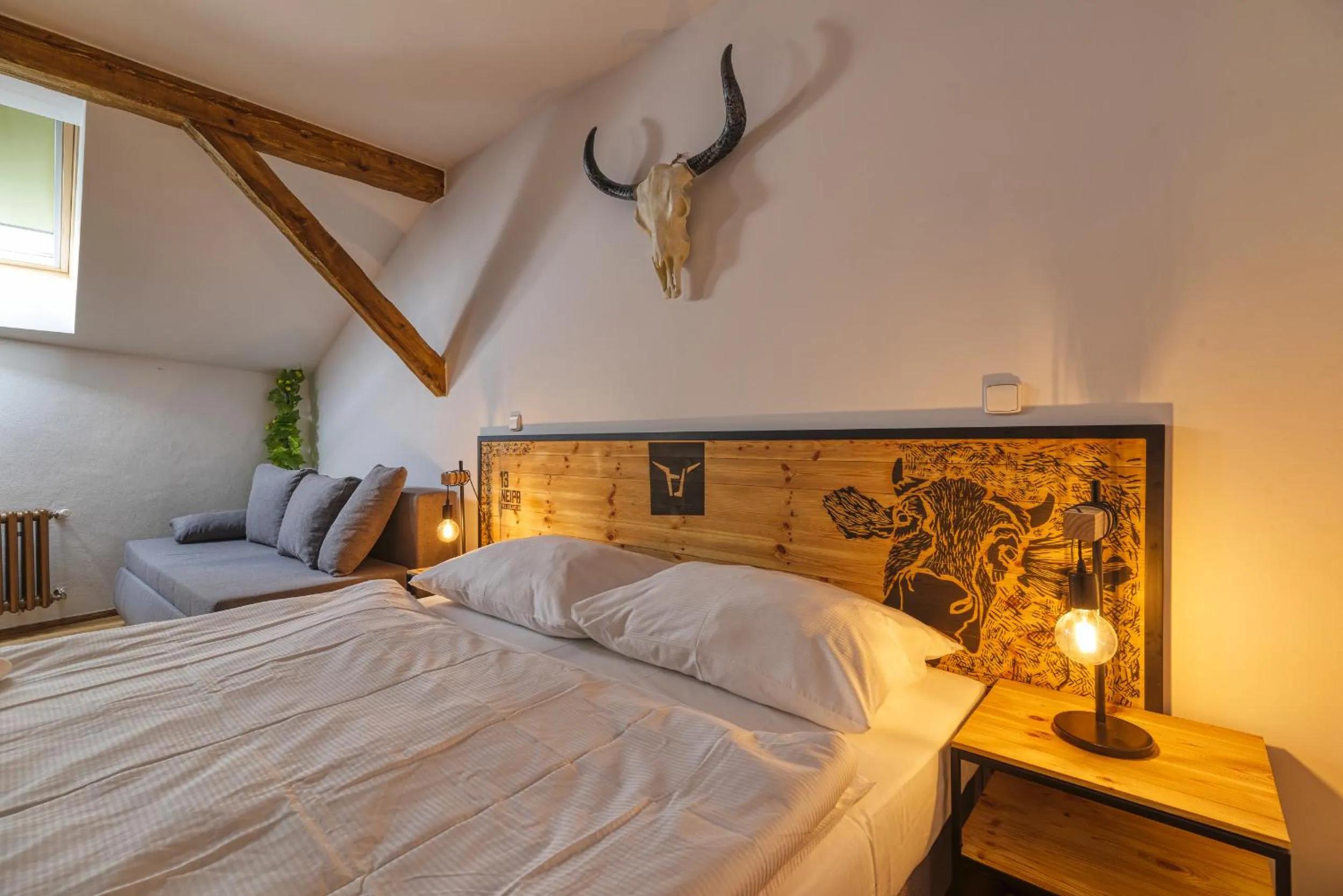 Bed in Pivní Hotel