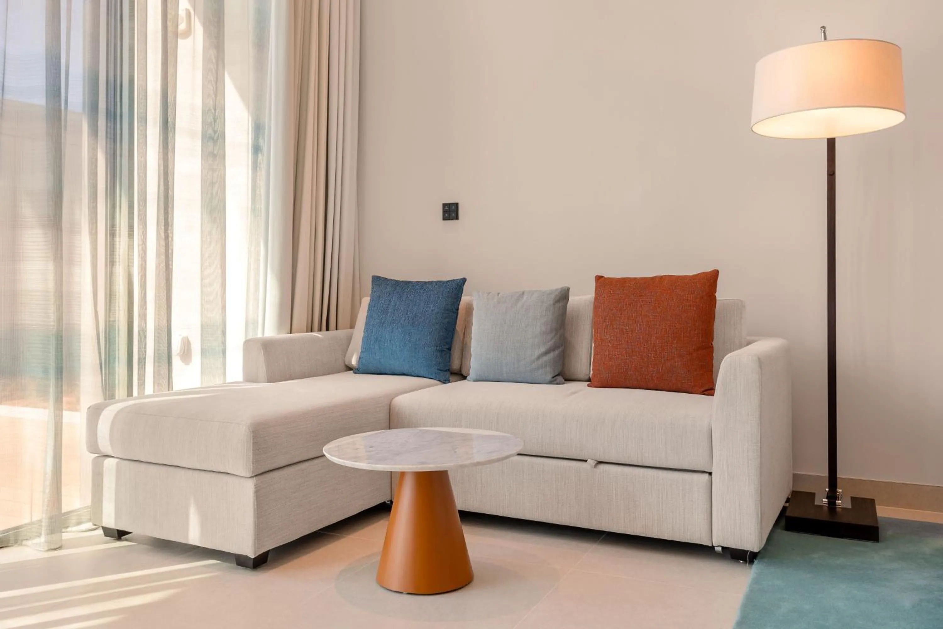 Seating area in Ajman Hotel & Villas by Blazon Hotels