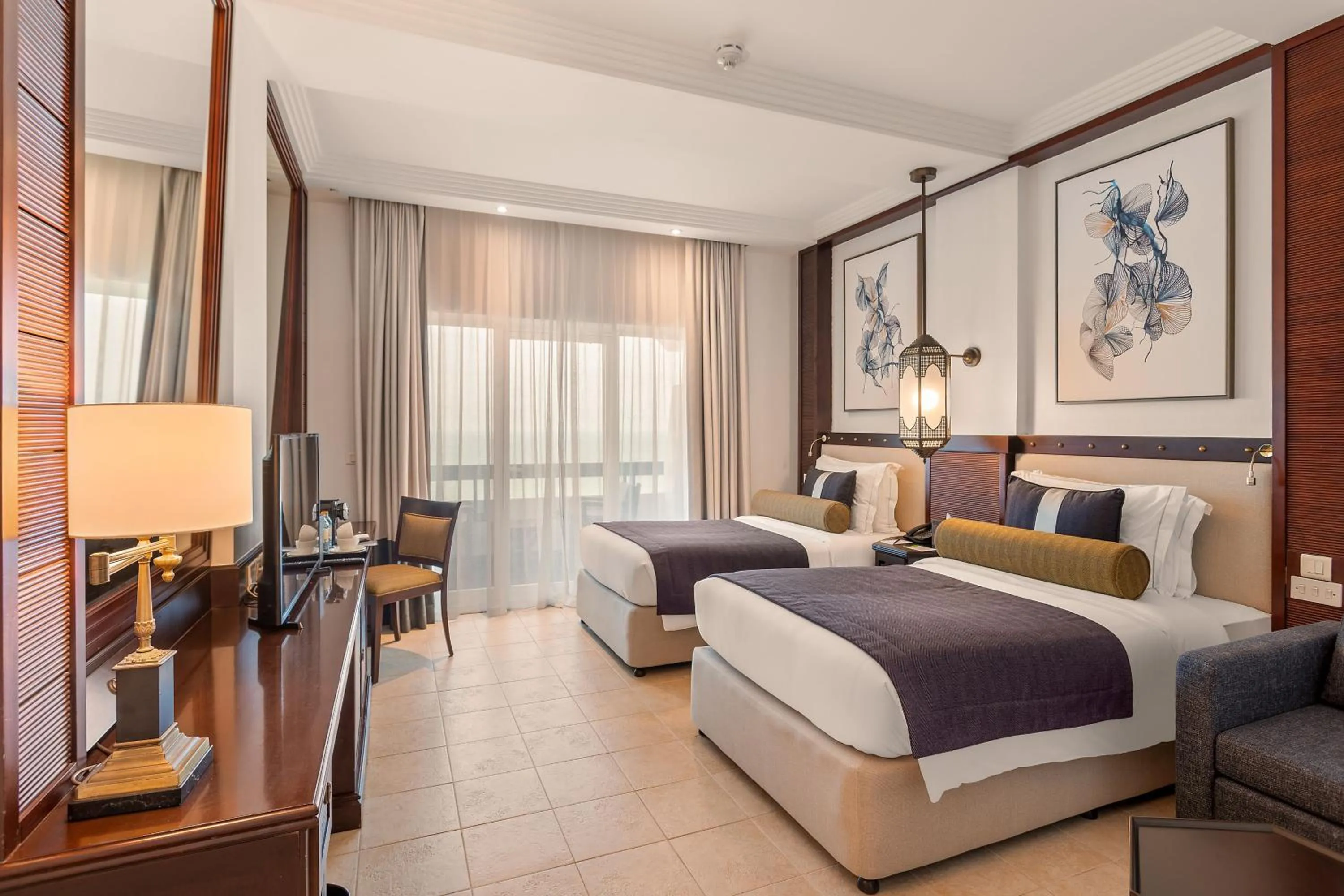 Bed in Ajman Hotel & Villas by Blazon Hotels