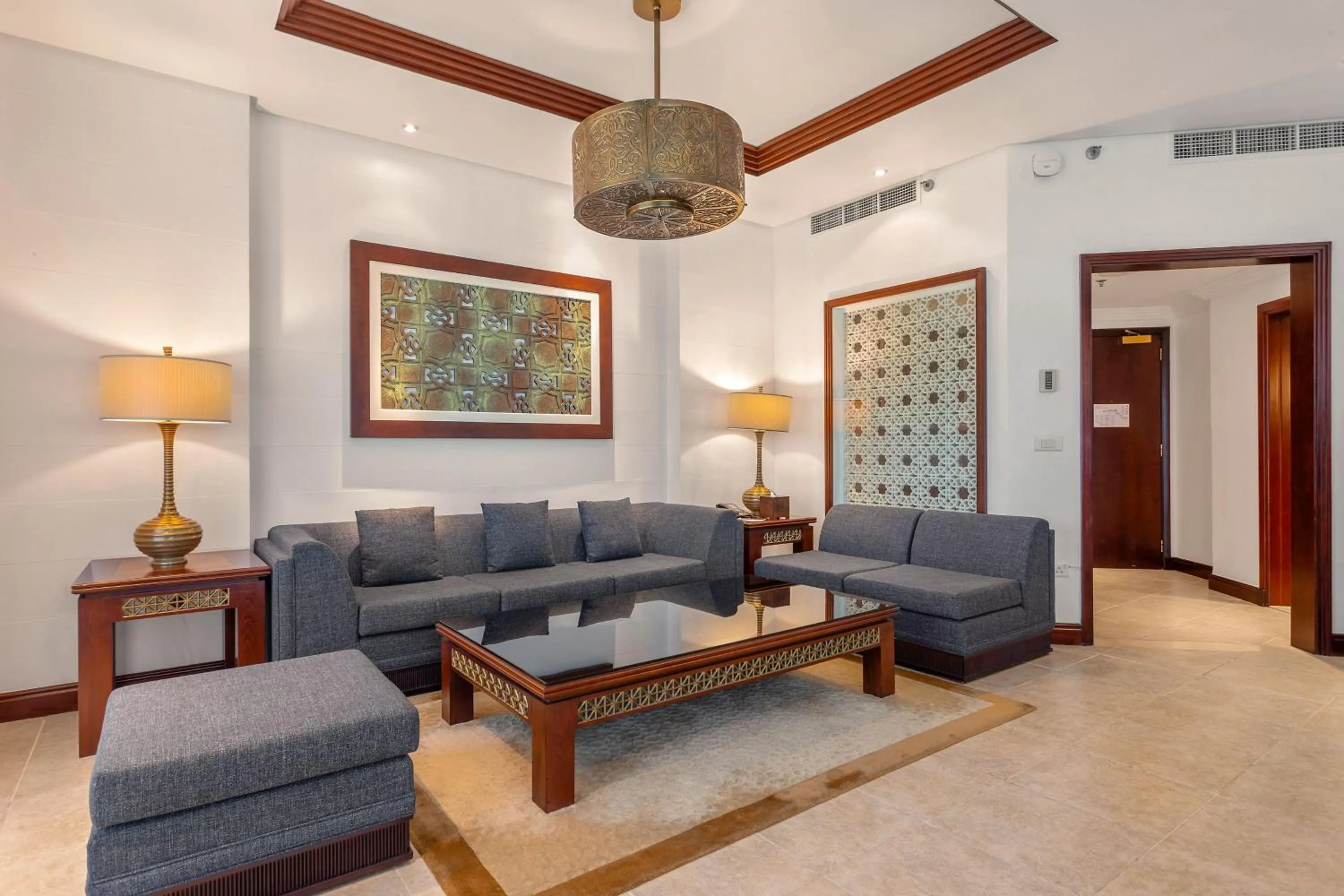 Living room in Ajman Hotel & Villas by Blazon Hotels