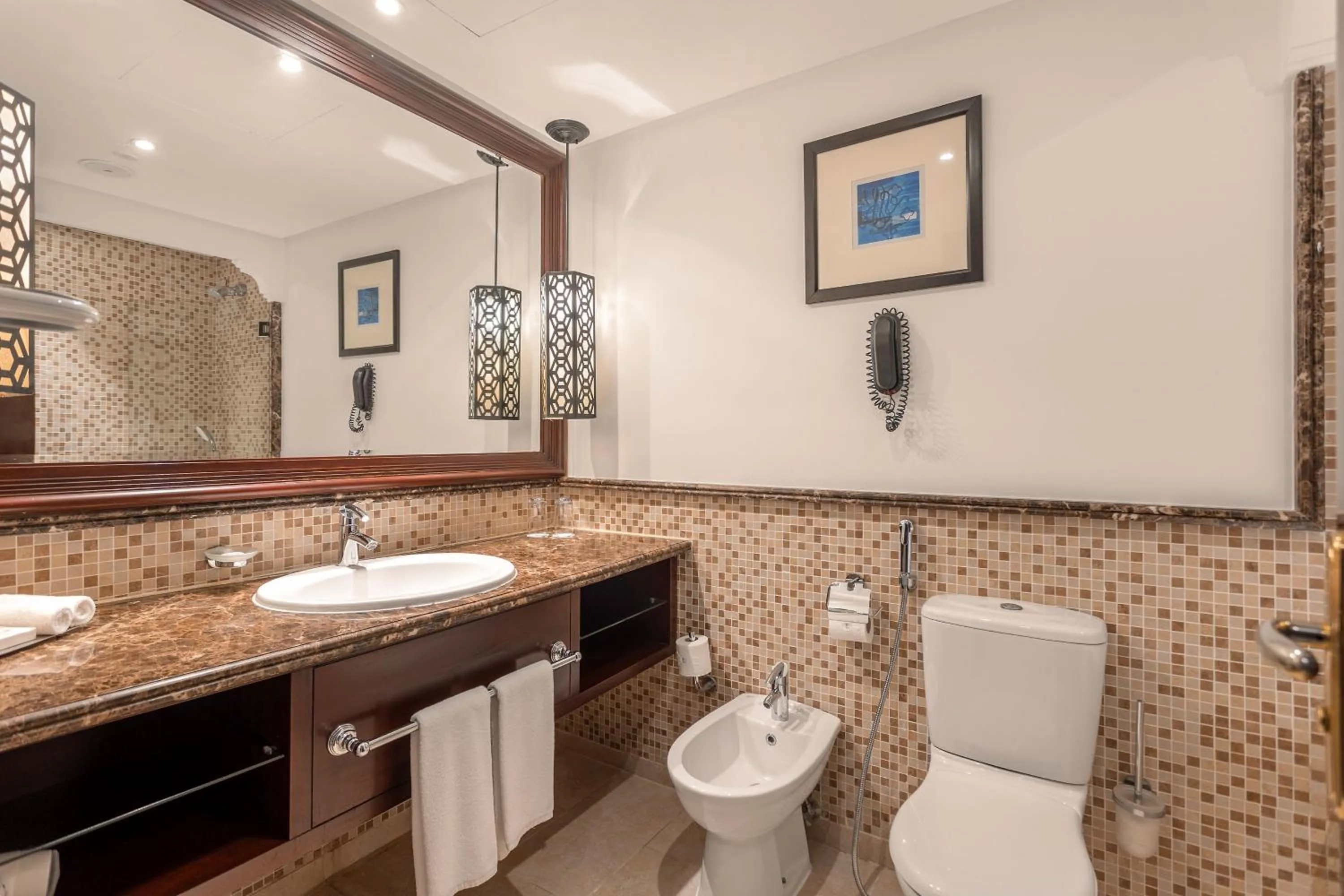 Toilet in Ajman Hotel & Villas by Blazon Hotels